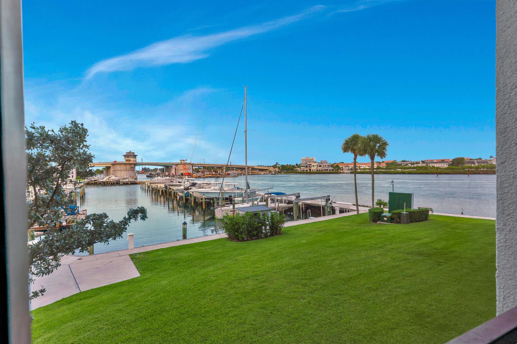 Rare corner unit in the sought-after Jupiter Cove. Enjoy the lifestyle with stunning ocean and intracoastal views immediately upon entering the condo. Brand new porcelain tile throughout and a complete chef's dream kitchen with brand new high-end cabinetry and quartz countertops. This meticulously maintained condo offers abundant natural light, a spacious floor plan with an additional den/office that can be used as a 3rd bedroom, and resort-style amenities. The amenities include tennis courts, gym, extra dining area in the clubhouse, property manager onsite, fully gated community, marina on-site, pickle ball, large size pool, and so much more. Enjoy living in the heart of Jupiter with easy access to dining, shopping, and endless boating.