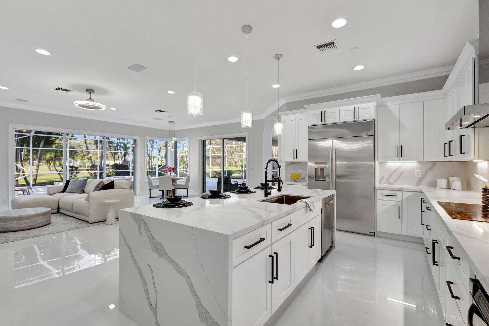 Stunning Newly Renovated Home - Move-In Ready!  Discover your dream home with this beautifully and completely renovated property, designed for modern living and timeless elegance. This immaculate house boasts:1 - Premium Living golf course community: Bay Hill Estates stands out as a premier golf course community, offering a selection of custom-designed luxury homes in a variety of styles and price ranges, catering to diverse tastes and budgets. Golf membership is optional with a great discount.2 - New Designer Furniture: Thoughtfully selected pieces that blend comfort and style effortlessly. Sale with all furniture (Optional).3 - Brand-New Gourmet Kitchen: Sleek countertops, modern cabinets, and premium appliances perfect for cooking and entertaining.