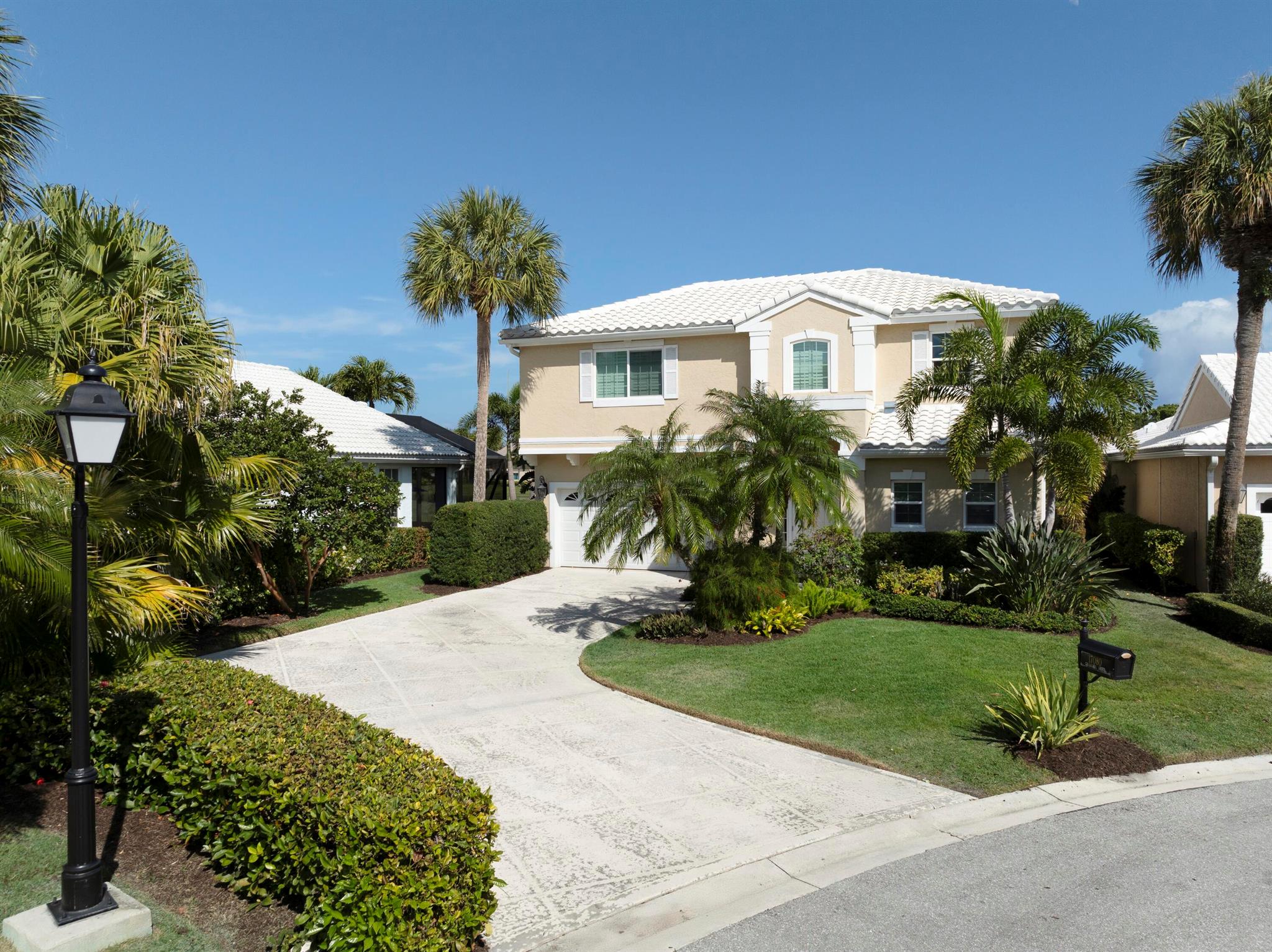 Experience Coastal Living at its finest! This 3-bedroom, 2.5-bath, 2 story home is nestled in sought-after, Bridgegate, in the gated community of Jonathan's Landing. The home is being offered fully furnished and move-in ready! The open-concept design provides a bright and inviting space and recently renovated patio overlooks the serene lake. Start your mornings with breathtaking sunrise views, enjoy a round of golf, take a stroll along the nearby beach just minutes away, or set out for an unforgettable South Florida fishing adventure. This exceptional lifestyle has something for everyone!Jonathan's Landing offers club membership (not mandatory), providing access to world-renowned Fazio-designed golf courses, fitness center, tennis, dining, dog park, playground and a marina.