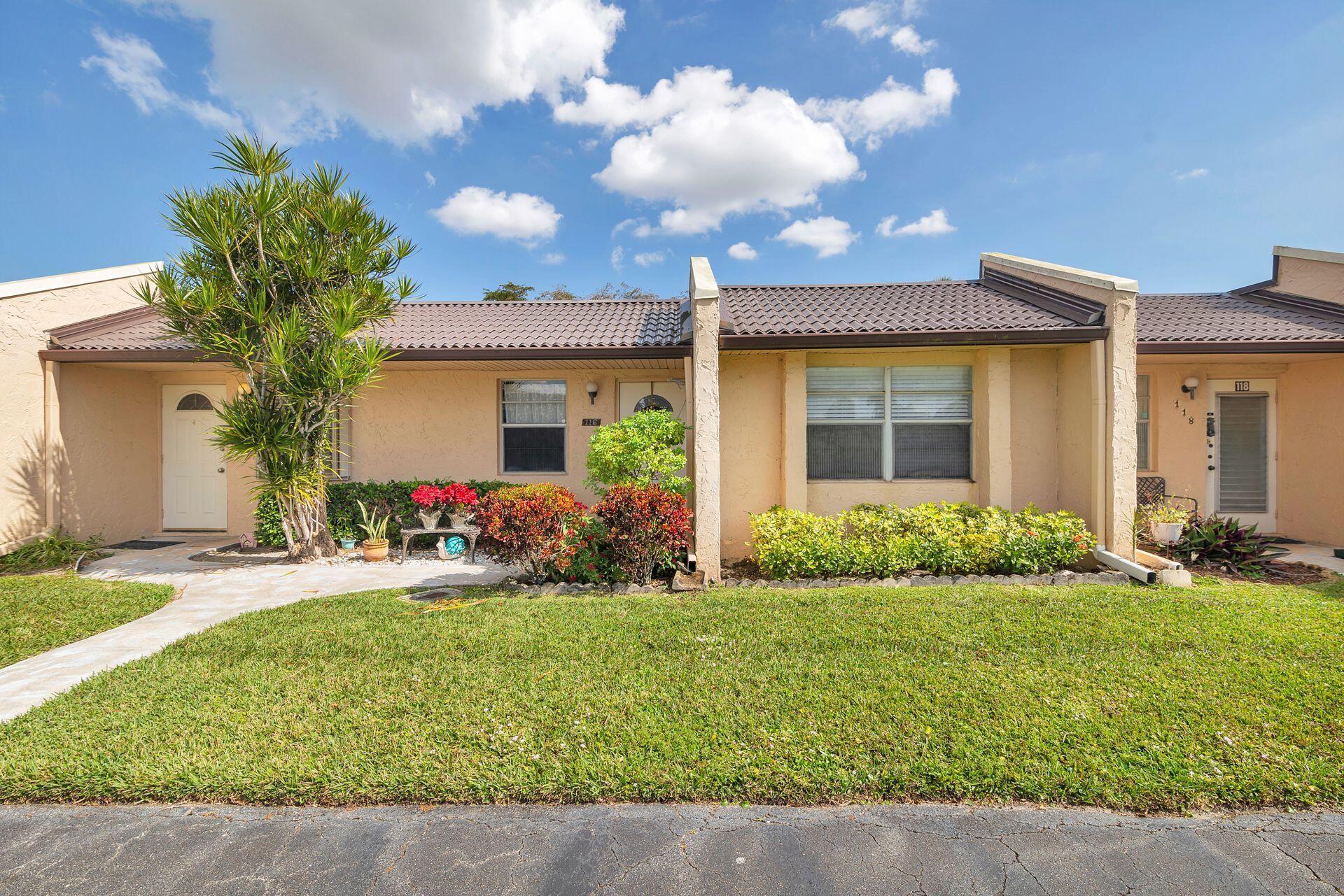 Photo 1 of home located at 116 Golden Lakes Boulevard, West Palm Beach FL