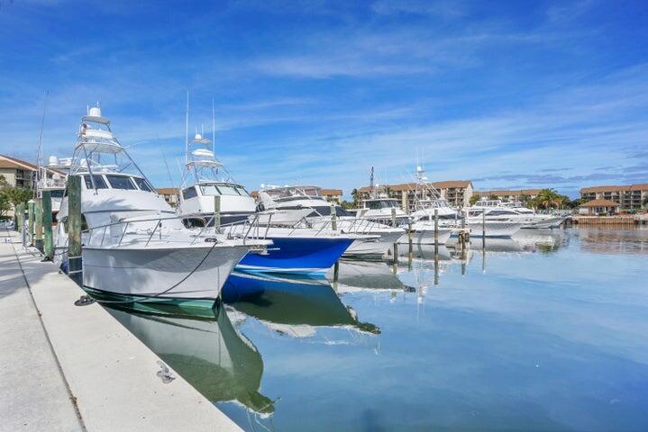 THIS DESIRABLE FIRST FLOOR UNIT,TURNKEYCONDO OFFERS A RARE OPPUTUNITY TO EMBRACE THE BEST OF JUPITER LIVING WITH STUNNING VIEWS OF THE MARINA AND WALK RIGHT OUT TO THE POOL OR TAKE A WALK OR BIKE RIDE TO JUPITERS FINEST BEACHES AND FINE RESTURANTS AND SHOPPING.THIS 2 BEDROOM, 2 BATHROOM CONDO HAS NEW HURRICANE IMPACT GLASS, NEW APLIANCES,BRAND NEW ACCAN COME FURNISHED OR UNFUNISHED.NEW ELEVATORS,NEW ROOF,NO SPECIAL ASSESSMENTS. COME CHECK OUT A SLICE OF PARADISE.