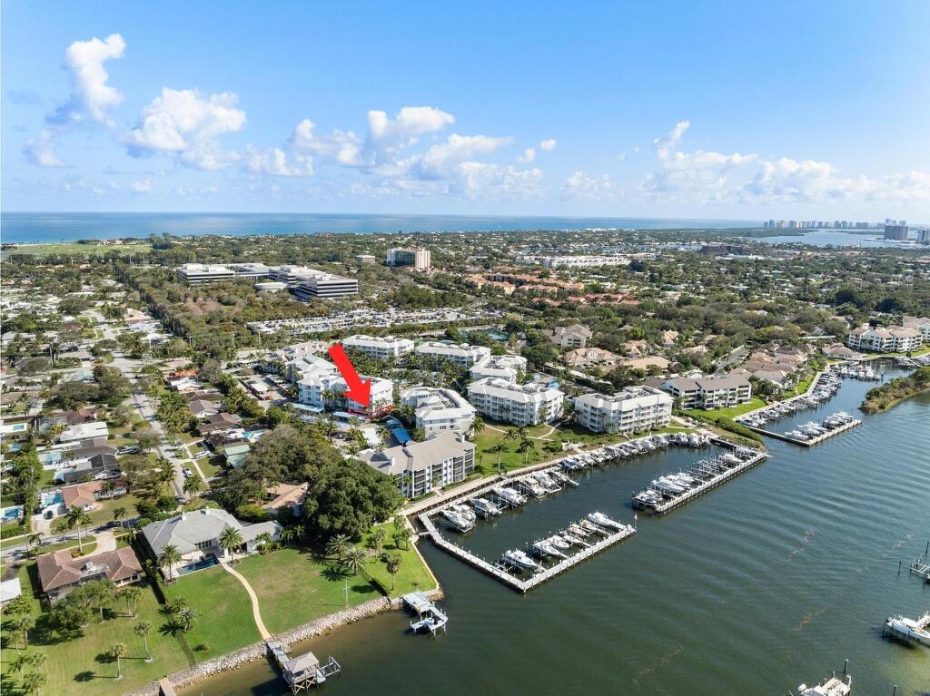 This highly sought after and rarely available ''Antigua'' Model is a 1st FLOOR CORNER unit located just a few steps to the wide water intracoastal, private marina & impressive resort style amenities! Truly, a boaters dream with the ability to rent or own a slip! With an impressive list of upgrades, this light & bright condo shows like a model & is available furnished if desired! This condo offers Impressive SQ footage, Impact glass throughout, New Hunter Douglas window treatments, Bosche SS Appliances, custom closet systems, wood-like ceramaic flooring and tons of storage. Additional green space off your large covered patio is perfect for pet owners! Tranquil-Resort Saltwater Pool, Spa, Fire Pit, Clubhouse, BBQ grills, Fitness Center, Tennis/Pickle Ball Courts, Bocce Ball and much more.