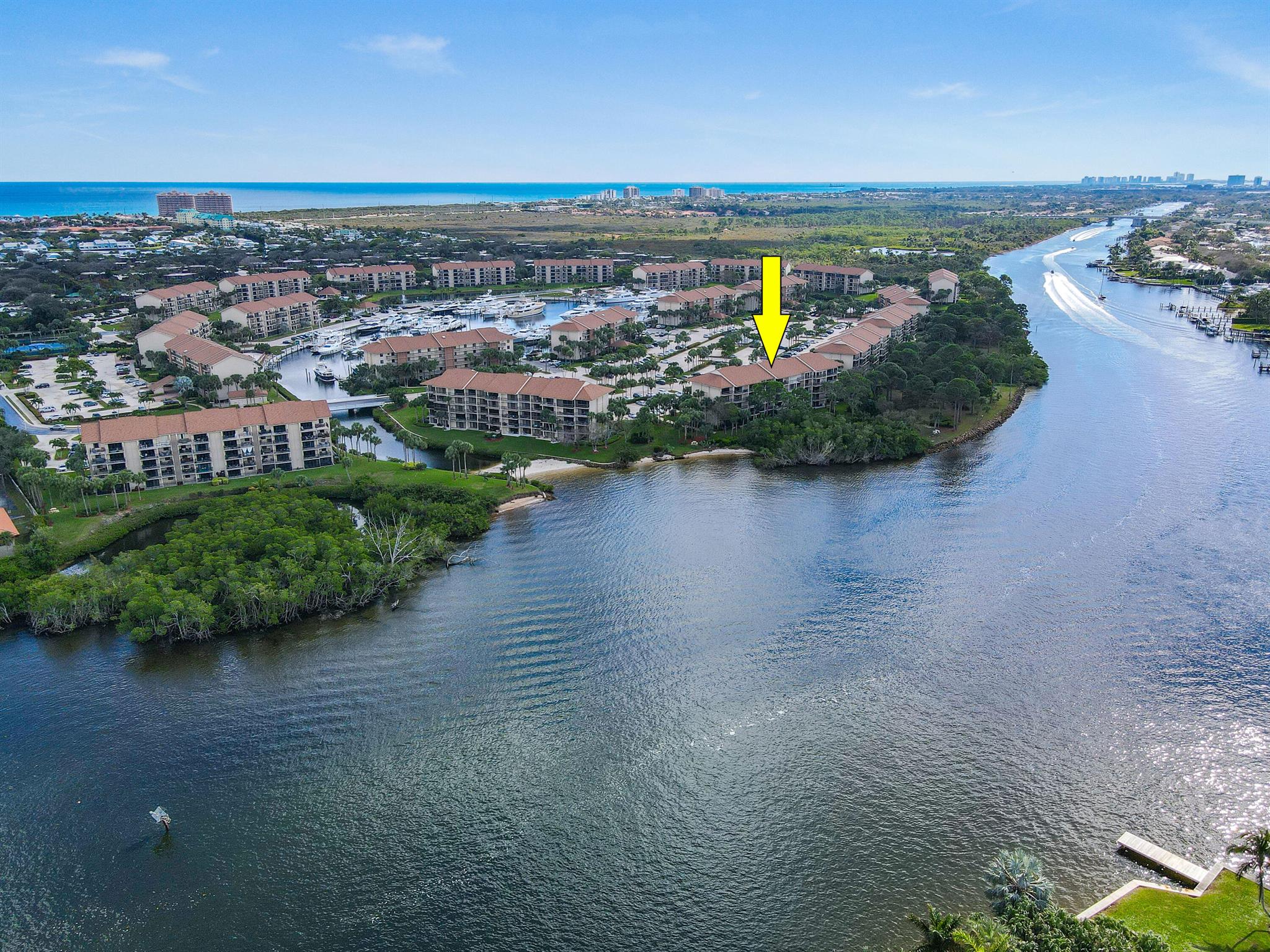 This is the beach getaway you have been waiting for just 1 mile from Jupiter/Juno Beach. You will enjoy AMAZING INTRACOASTAL VIEWS from this BEAUTIFUL condo in one the most DESIRABLE building at the Marina at the Bluffs. You will be delighted the second that you walk into this fully furnished 2 bedroom, 2 bathroom, plus an office workspace/laundry room condo. You will enjoy views of the water from your primary bedroom and the family room. Sit and relax on your large balcony as you watch the boats go by. The kitchen has all stainless steel appliances and plenty of storage. You will have peace of mind with a 2024 AC unit, 2020 HW, and 2021 Roof. All assessments have been paid and the condo inspection on this building is complete.