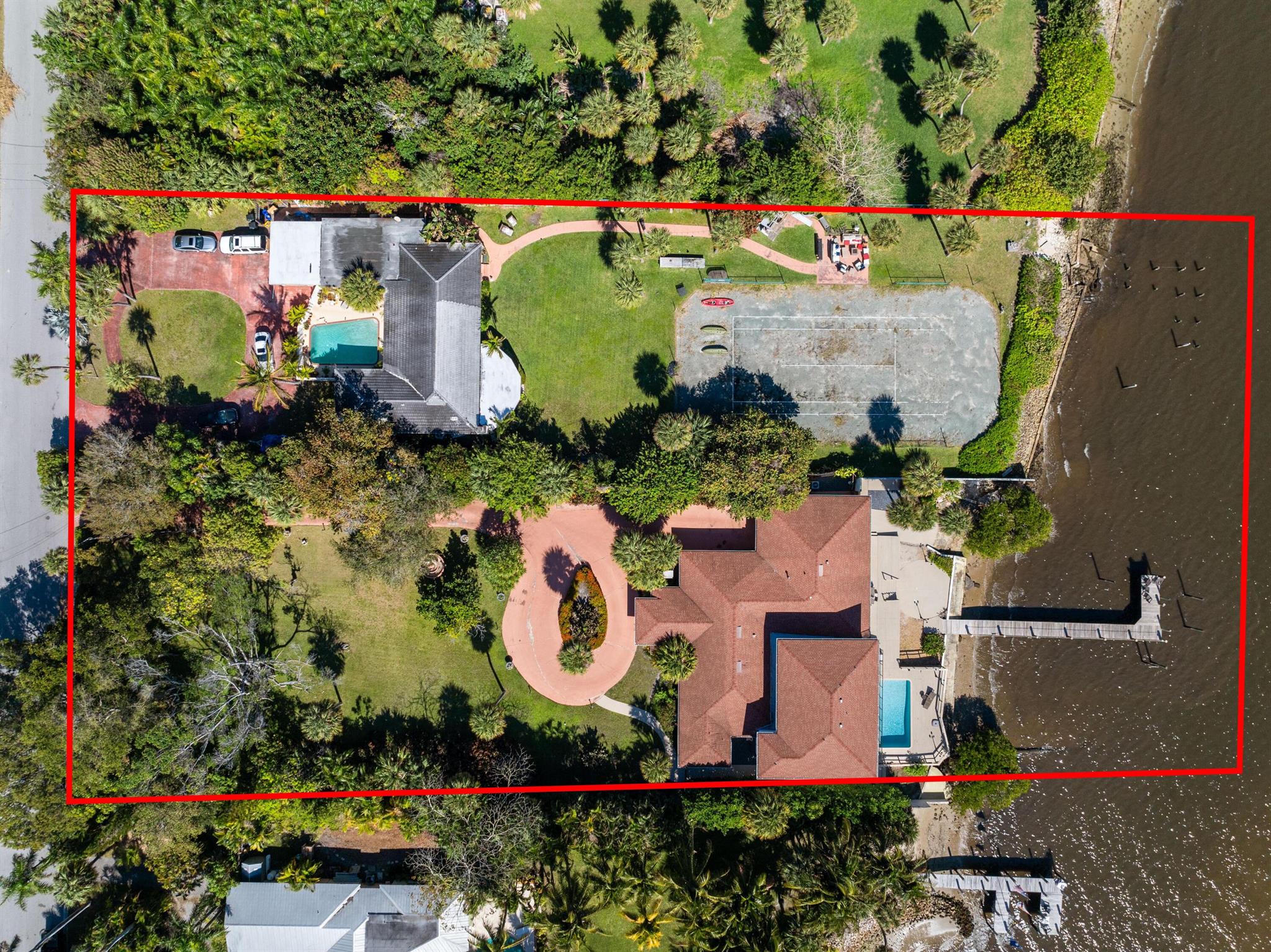 Rare Waterfront Opportunity: 220' of Direct Intracoastal Frontage in Highly Desired Lake Worth Beach. A rare chance to own 220' of Intracoastal frontage on nearly 2 acres in LWB. This exclusive offering unites 524 & 530 S Lakeside Dr., providing a rare chance to build a grand estate or enjoy as-is. With breathtaking water views, this property offers endless potential--move in, renovate, or build a luxury compound. The property includes 2 residences with 8 beds, 7.5 baths, a private dock, enclosed sunroom, fenced yard & pool deck with a pool & hot tub. Highlights: wood-beam ceilings, fireplace, garage & circular driveway. Enjoy easterly breezes, stunning sunrises & western sunsets in this prime location, just 5 mins to the beach, Four Seasons, etc. 1 of LWB's largest Intracoastal properties