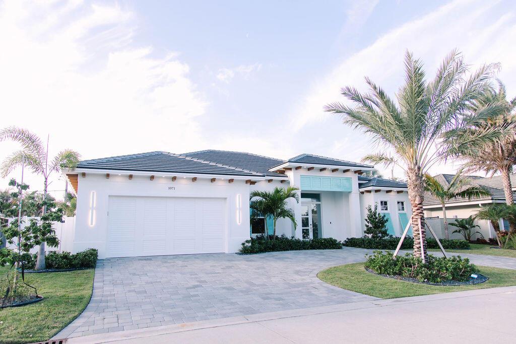 Welcome to your own Island Paradise! This new construction 4 bedroom/3 bathroom home is everything you could need and MORE! Built in 2024, no detail was missed from the lusciously landscaped yard with beautiful pool & spa to the meticulously designed interior with luxury finishes & fixtures. This property features spacious guest bedrooms, office/den, a 2 car garage, large laundry room, covered patio perfect for entertaining, huge master suite with two walk in closets, separate tub and shower that will rivel any spa! Walking distance to the most beautiful beaches in South Florida and top rated marinas for boat lovers and avid fisherman. Singer Island is a hidden gem that feels like a true paradise, you'll never want to leave!