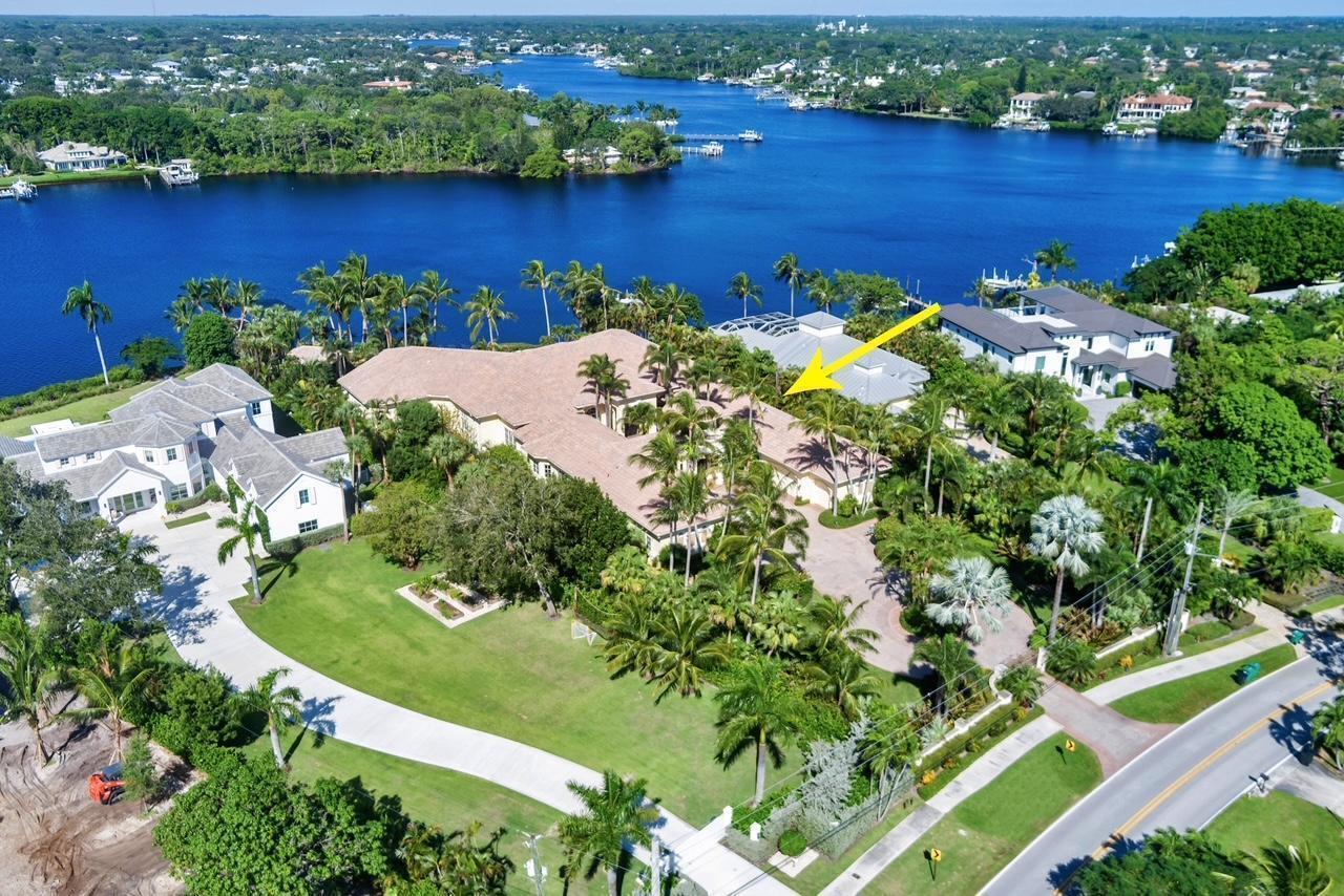 Hidden on the Loxahatchee River, the most expansive, private waterfront estate in all of Tequesta boasts 130' of pristine, Old Florida, Western exposed River frontage. Gorgeous @17,000' single-story on a massive 52,000' lot features 5 grand bedrooms, 5+ bathrooms, 5 car garage, 6th AC'd storage bay, sprawling resort deck & pool, CBS gazebo, boathouse & covered lift.  The magic of this property starts at the grand courtyard & colossal iron/glass entry doors. Designed w/ privacy & entertaining in mind the River & pool are perfectly framed backdrops to every common area. One-of-a-kind 3,000' lanai & nearly twenty' ceilings. A few minutes by boat to the Jupiter inlet, premier waterfront dining, shopping & close proximity to top private & public schools & golf, the location can't be beat.