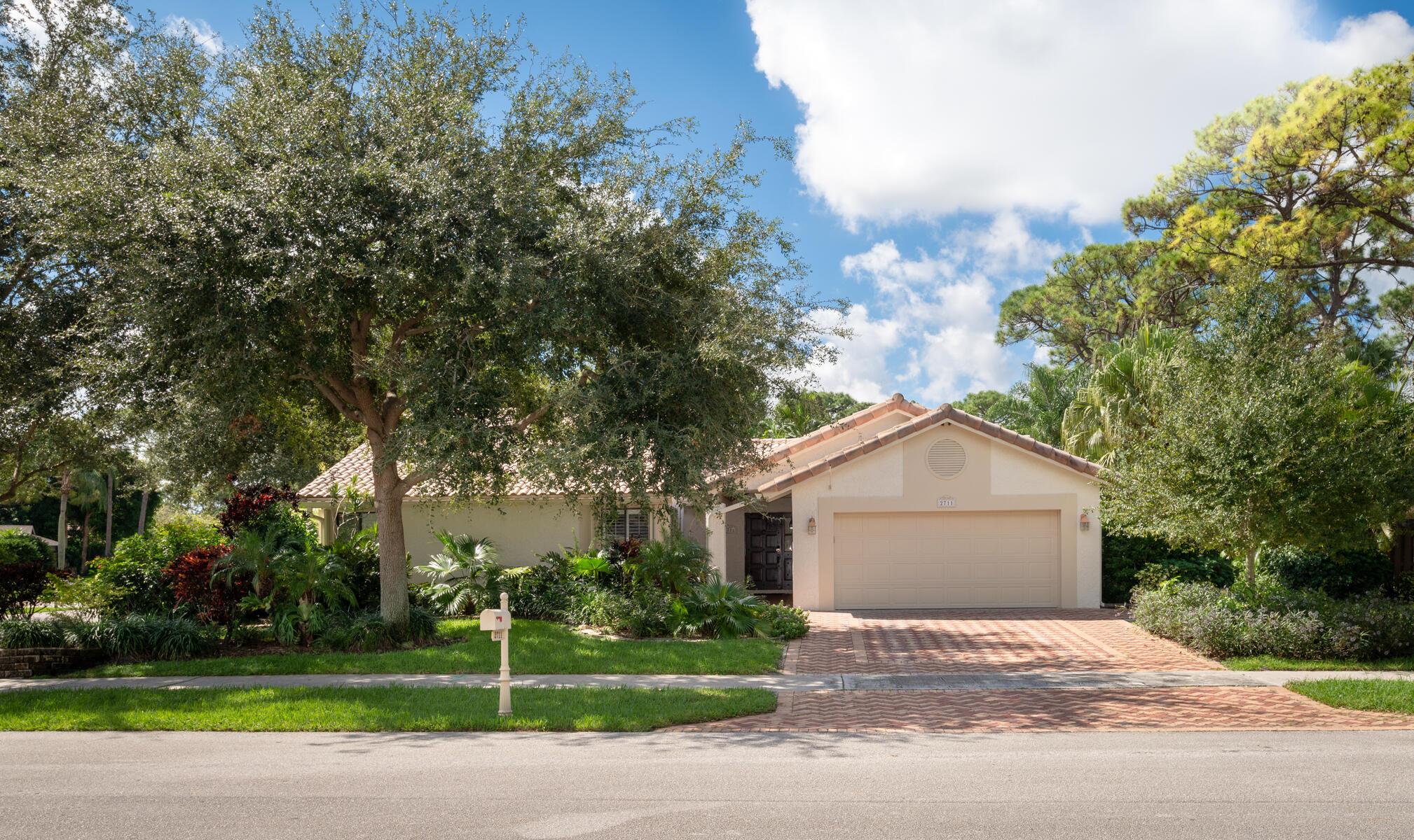 Gorgeous 3-bedroom, 2-bathroom corner-lot home with a pool, a 2-car garage, and an extra-wide paver driveway, surrounded by beautiful landscaping in the highly sought-after Timbercreek community. Nestled in the heart of Boca Raton, this lushly landscaped neighborhood offers exclusive amenities, including two scenic lakefront parks, a basketball court, a children's playground, and a gazebo sitting area perfect for picnics. Conveniently located just a mile from the award-winning Town Center Mall, top-rated restaurants, Publix, gyms, banks, gas stations, and pharmacies, with easy access to major highways. Zoned for A-rated schools and just minutes from FAU, this pet-friendly community combines comfort, convenience, and an exceptional lifestyle.