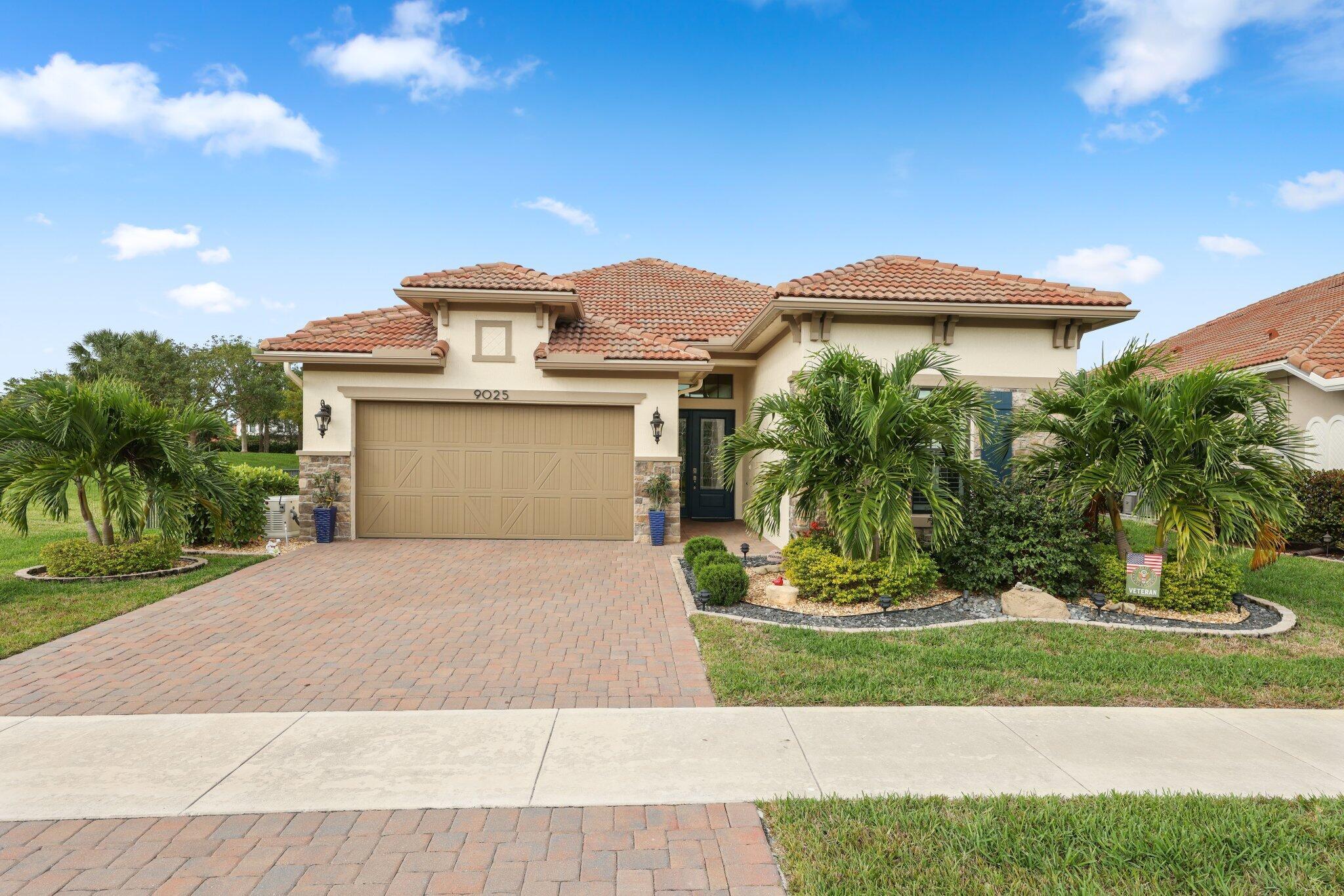 Welcome to 9025 Porto Way, located in the active 55+ community of Four Seasons Parkland.  This inviting 3-bedroom, 2.5-bathroom home spans 2,601 square feet, offering a harmonious blend of luxury and comfort. The interiors boast exquisite wood floors and plantation shutters, enhancing the warmth and charm throughout. The heart of the home is a chef's dream gourmet kitchen, perfect for culinary adventures and gatherings. An entertainment center offers space for leisure and enjoyment. Step outside to discover a screened patio and a sprawling fenced yard ideal for outdoor relaxation. Additional features include a full-house generator, water softener, and an insulated garage. Nestled on a 9,641 square foot lot, this home promises a perfect blend of elegance and convenience.