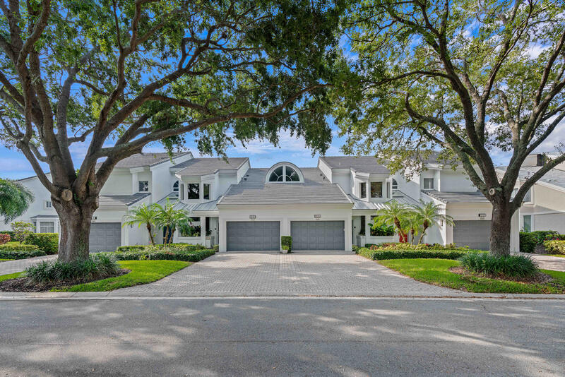 The pinnacle of sophisticated design in this 2nd floor Harbor Home with breathtaking water views and design. Three bedrooms plus den, 2 1/2 baths entirely remodeled with the finest of materials and wide water views from all rooms. Open kitchen with marble island, glass tile accent wall, custom soft close cabinets, built in desk. Home features full audio/visual system, white porcelain floors in main rooms, electric sunshades, private elevator, den/media room entertainment wall with glass tiles and marble and luxurious baths. Temperature controlled comfort with 2 AC units. Includes new composite dock for up to 34' boat. Spyglass Way, a quiet tree lined street close to clubhouse with new roofs, newly painted buildings, and new driveway pavers.