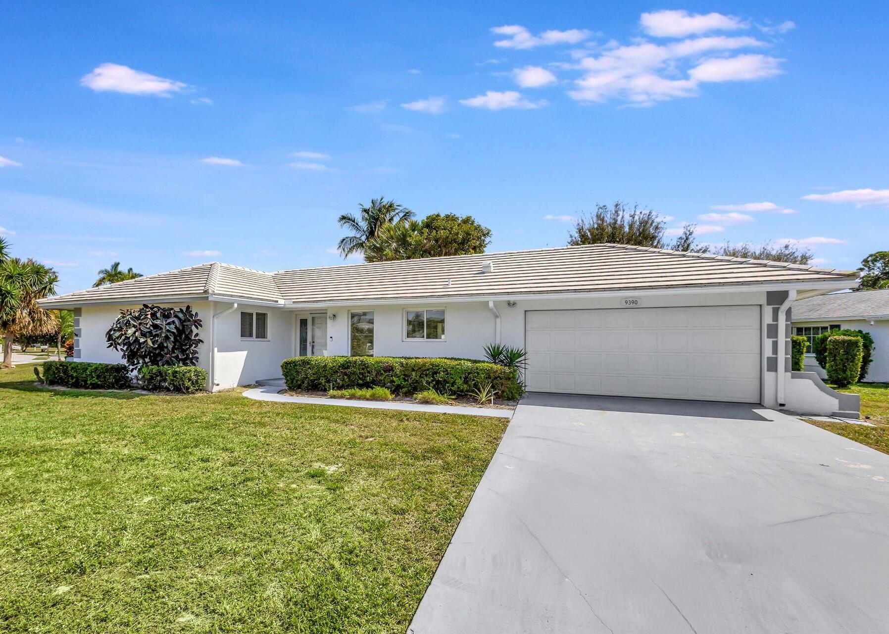Tequesta's Paradise, The Little Club 55+ Community. This Beautiful CBS Home Offers 2 Bedrooms, 2 Baths and 2 car Garage. Newly remodeled kitchen with Samsung appliances. New Vinyl flooring throughout. Separate indoor laundry room with storage cabinets is next to the garage. PGT windows throughout. It sits on a corner lot with an extra long driveway. Low HOA fees (covers fiber-optic TV & Internet) Amenities include Olympic sized pool, clubhouse, unlimited golf, tennis, and pickle-ball for those who enjoy an active lifestyle! There are also plenty of social activities and events planned throughout the year. All of this within minutes of the world's most amazing beaches and the charming village of Tequesta.