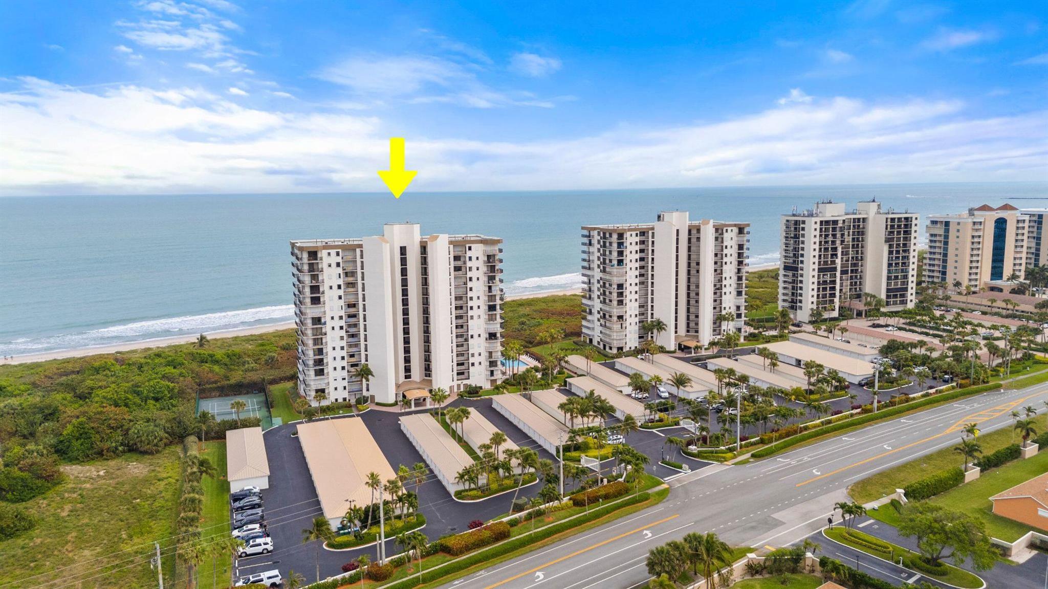 OCEANFRONT CORNER UNIT!! Welcome to this bright and spacious 3-bedroom, 2-bathroom oceanfront corner unit, offering breathtaking ocean views and an abundance of natural light! This home has been thoughtfully updated, including a newly renovated primary bathroom, new luxury vinyl plank flooring and fresh paint throughout, newer A/C, hot water heater and washer/dryer. The oceanfront primary suite features floor-to-ceiling glass sliders that open to a private balcony, two walk-in closets with built-ins, & a spa-like ensuite bathroom with dual vanities & a walk-in shower. Both guest bedrooms also offer balcony access, providing a serene escape for family & visitors. In addition, TWO garage spaces are included - a rare find! Don't miss this incredible opportunity to own an oceanfront residence