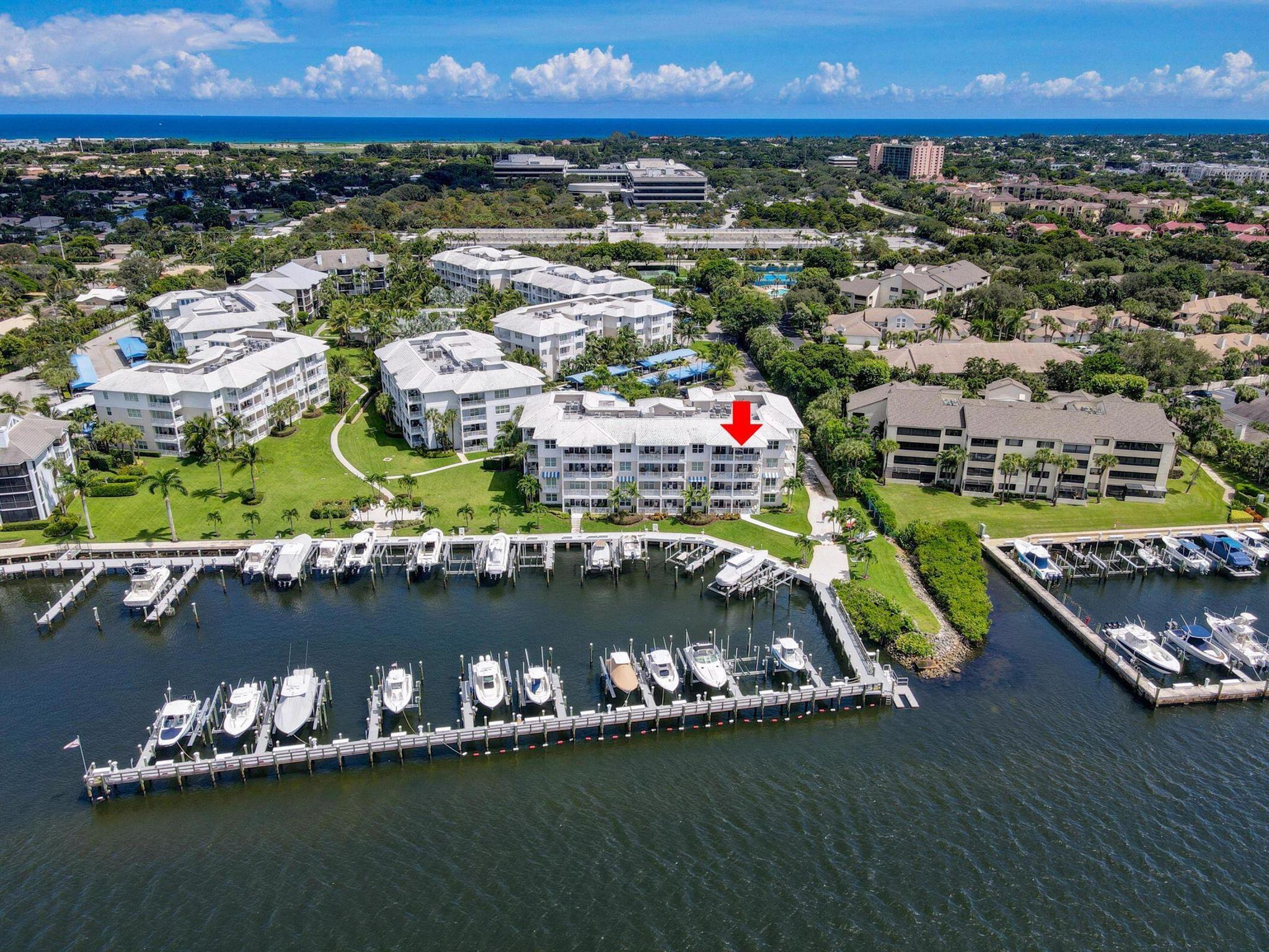 This is THE premier penthouse in Bay Colony, featuring a 27' balcony with direct Intracoastal views. Built in 2015, this bright, spacious 3/3 home is the only 4th floor residence with direct water views to the west and south. A house-sized gourmet kitchen, open floor plan living area and 3 split bedrooms make this a gracious home.  Attention to detail is evident throughout, with $400K+ in upgrades and timeless design. A endless parade of boats and the beauty of sunshine on the water and nightly sunsets are the view from floor-to-ceiling sliders in the living room and master bedroom, plus direct water views from every room. Minutes from the beach, Bay Colony offers a private marina, tennis, pickle ball, pool, firepit and fitness center. Pets are welcome. This is a VERY special home!