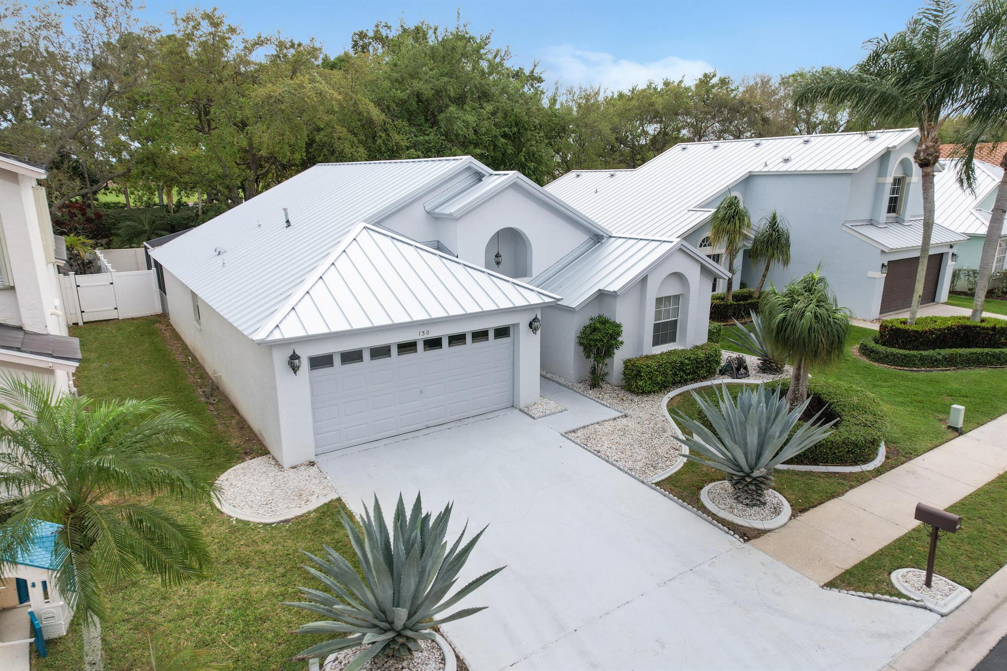 A very special home in the special community of Egret Cove. Egret Cove is Nested on the quite side of Maplewood Drive and is walk distance to parks, shopping Restaurants and so much more. This Beauty CBS home offers brand new metal roof installed Feb 2025, vaulted ceilings, tile floors, a split bedroom plan. Oversized screened patio for entertaining in private backyard. Full two car garage and much more, this is truly a must see.  All information deemed reliable but not guaranteed, buyer or buyers agent to verify important to buyer.