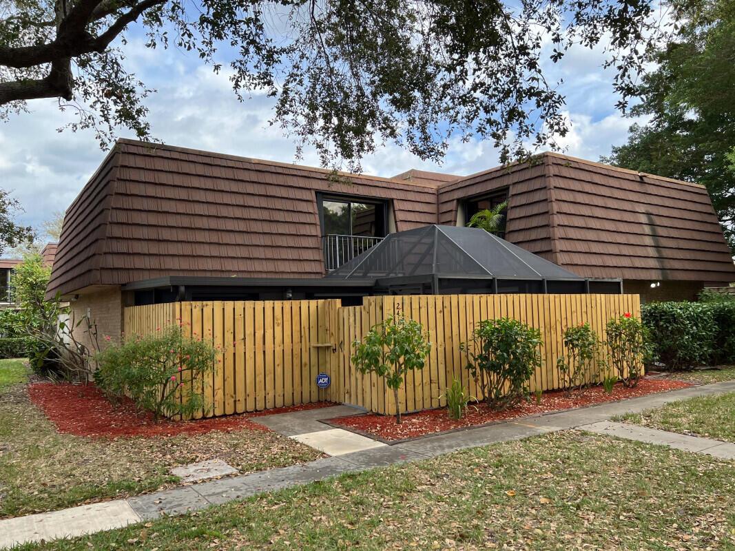 Tastefully updated townhome in the serene Garden Lakes community, ideally located in the heart of Palm Beach Gardens. This move-in-ready 2-bedroom, 2.5-bath home is completely turnkey and comes with the pictured furniture and appliances.Step outside to enjoy a brand new fence and fully screened-in patio, creating a private and relaxing outdoor retreat--perfect for soaking up the beautiful Florida weather. Feel at ease in your fully equipped home with accordion hurricane shutters, which can be effortlessly secured in minutes.Inside, the expansive kitchen boasts updated appliances, providing ample space whether you're entertaining guests, preparing a holiday feast, or enjoying a quiet meal at home. Need a home office? The downstairs office space, featuring durable vinyl plank flooring, comfortably fits two large desks&#x14;perfect for remote professionals or those seeking a dedicated workspace. The room could easily be converted to a third bedroom to add more sleeping space. 

Upstairs, the layout includes a spacious guest bedroom and a massive master suite with an en suite bathroom and TWO walk-in closets, ensuring ample storage for even the most extensive wardrobe.
Beyond your doorstep, this charming neighborhood offers walking access to parks, green spaces, and a shopping center just five minutes away.
Don't miss out&#x14;schedule a showing today and discover why so many love calling Palm Beach Gardens home!
