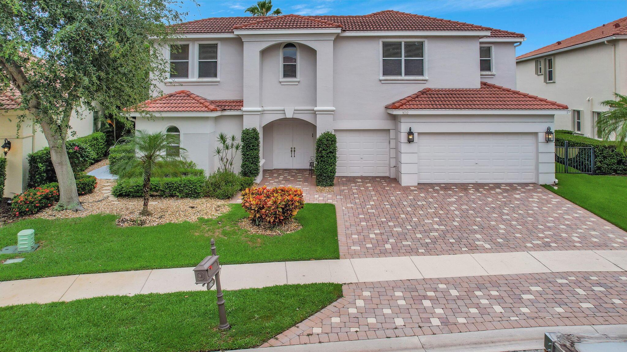 102 Villa Nueva Place, Palm Beach Gardens, Florida 33418