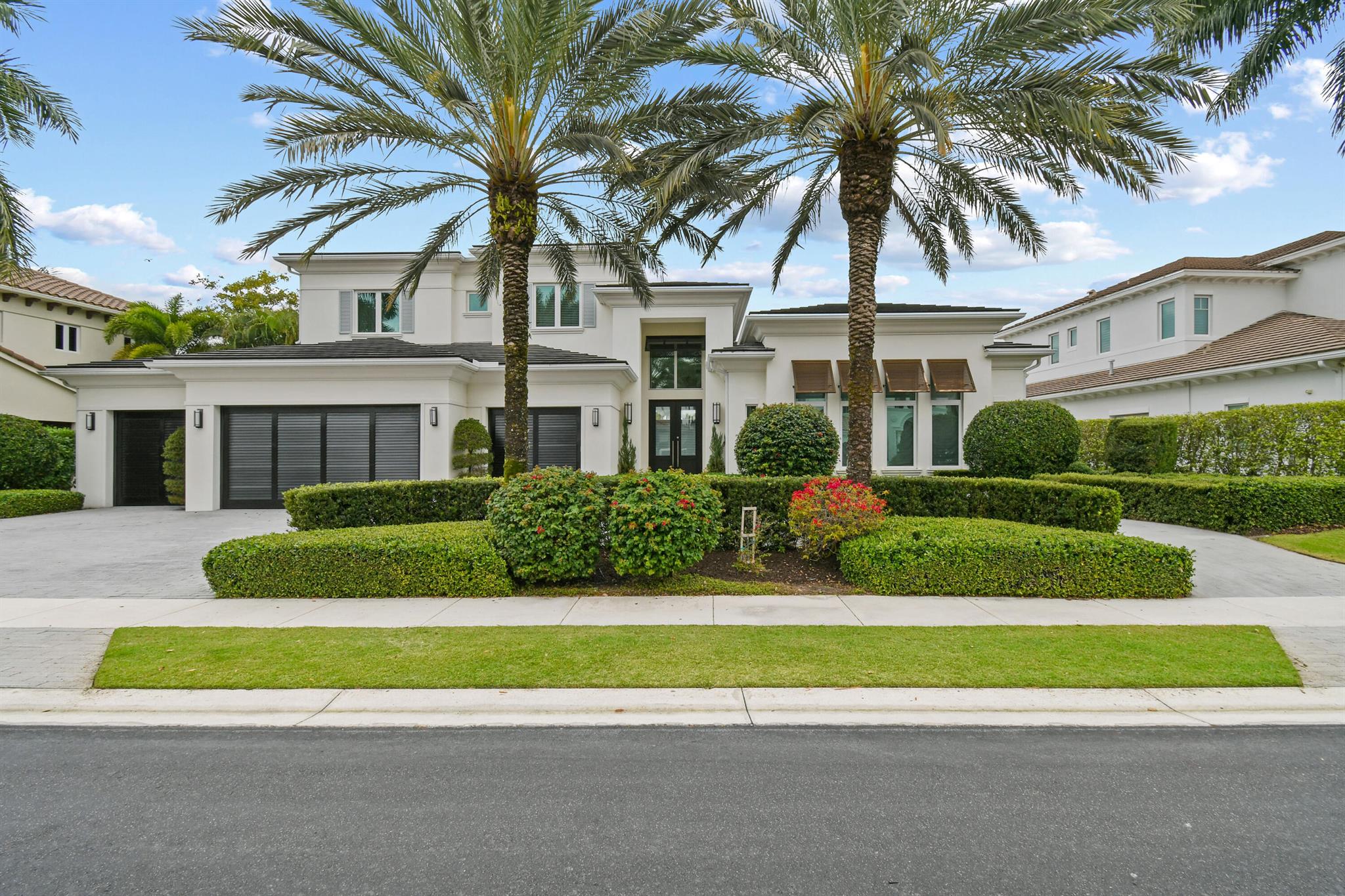 Tucked away in the exclusive Hermitage section of Frenchman's Reserve, this stunning 5-bedroom, 4.5-bath newer estate home with a full golf membership. This stunning residence offers the perfect blend of modern luxury and timeless design, coupled with the idyllic Florida luxury lifestyle offered by this renowned club community. Step inside to find bright and expansive living spaces with upscale finishes, luxury fixtures, honed limestone floors and rich hardwood.  The open chef's kitchen is designed for both beauty and function, featuring Cristallo Quartzite countertops, a Subzero refrigerator, Wolf gas stove, and a Thermador microwave drawer.

Designed for effortless indoor-outdoor living, the spacious club room with a wet bar flows seamlessly into the covered loggia and summer kitchen, perfect for al fresco dining and entertaining. The backyard is a private retreat, with a custom pool and spa overlooking serene lake and golf course views.

The first-floor owner's suite is a true sanctuary, featuring oversized custom closets and a spa-like bath with a rain showerhead, and dual vanities. Upstairs, three ensuite guest bedrooms provide privacy and comfort.

Beyond the home, Frenchman's Reserve offers an unparalleled lifestyle. The centerpiece of the community is the Arnold Palmer Signature Golf Course, complemented by top-tier practice facilities. Residents enjoy world-class amenities, including a state-of-the-art fitness center, full-service spa, tennis and pickleball courts, resort-style pool, and a grand clubhouse with fine dining and social events. With a vibrant calendar of activities and concierge services, every day feels like a luxury getaway.

Located in the heart of Palm Beach Gardens, Frenchman's Reserve is just minutes from pristine beaches, high-end shopping at The Gardens Mall, fine dining along PGA Boulevard, and easy access to major highways and Palm Beach International Airport.