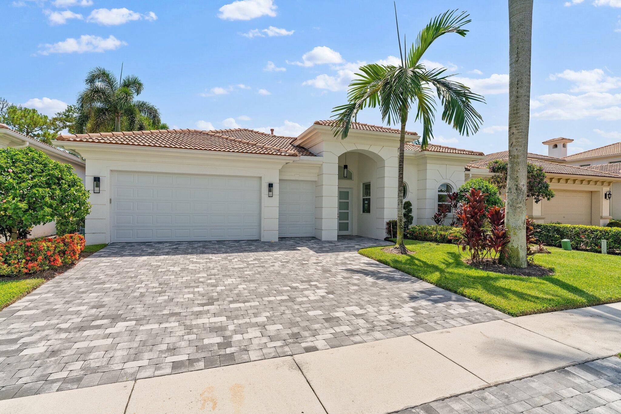 Beautiful courtyard home with guest house. Recently renovated with impact glass throughout, gourmet kitchen, salt water pool with summer kitchen. New Roof & Landscaping 2024. Located in the heart of Palm Beach Gardens, close to PGA corridor, and PBIA.