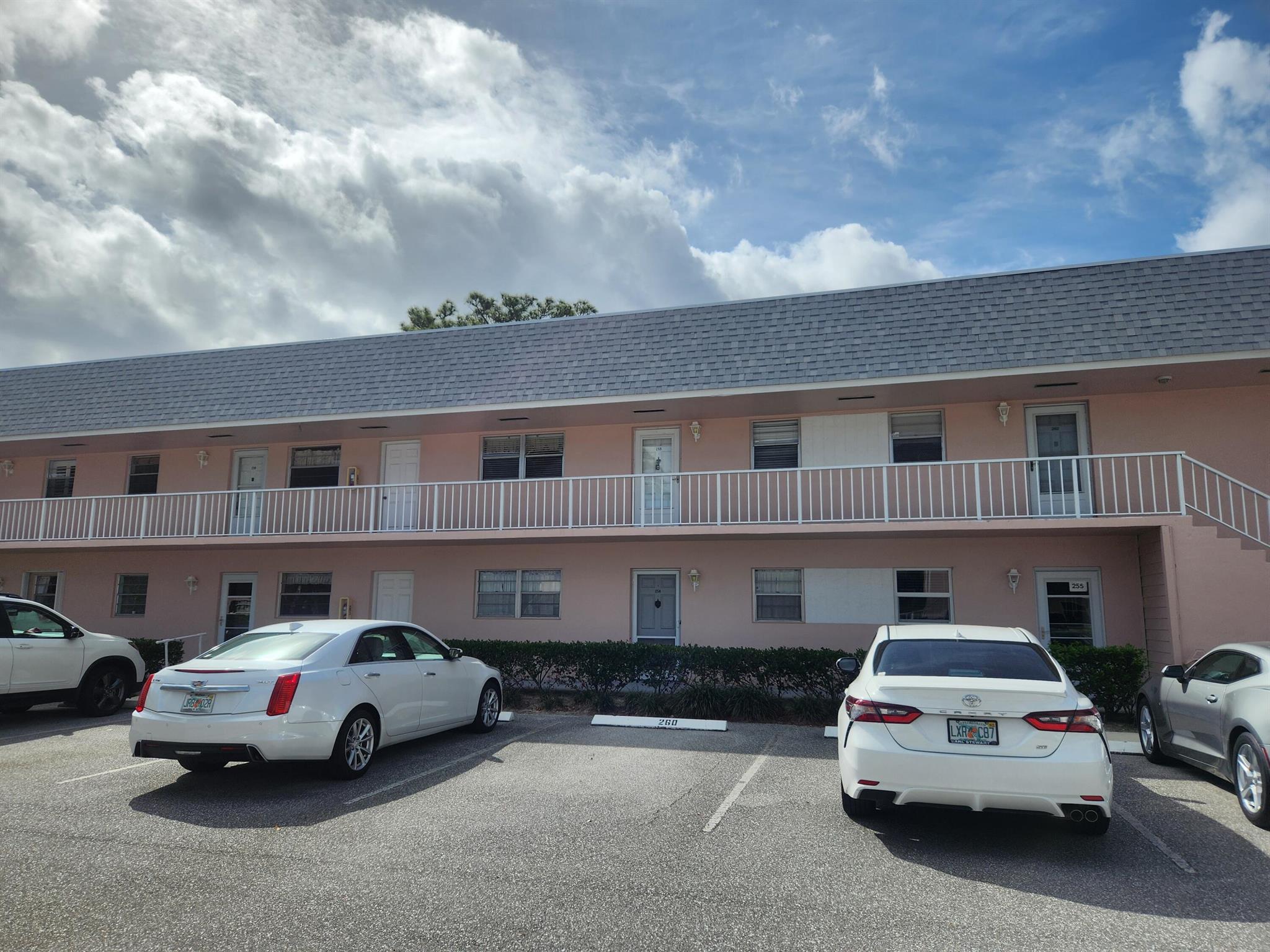 WELCOME TO LITTLE CLUB TEQUESTA A 55+ COMMUNITY. BRIGHT AND SUNNY SECOND FLOOR CONDO THAT HAS BEEN BEAUTIFULLY MAINTAINED AND READY FOR YOU TO MOVE IN.  LAMINATE FLOORS IN LIVING AREAS AND BOTH BEDROOMS. THE LARGE BALCONY OFFERS A VIEW OF THE POOL AREA AND THE LUSH GARDEN. THE PRIMARY BEDROOM HAS AN EXTRA LARGE CLOSET THAT OTHERS DON'T HAVE IN THIS FLOOR PLAN.  THE PRIMARY BATHROOM HAS A TASTEFULLY REMODELED WALK IN SHOWER.  LITTLE CLUB OFFERS AN ABUNDANCE OF ACTIVITIES STARTING WITH A 9 HOLE GOLF COURSE, INDOOR & OUTDOOR EXCERCISE CLASSES, HAPPY HOUR WEDNESDAYS, PICKLE BALL, BOCCE BALL, BINGO, CANASTA AND MAHJONG AND AN EXTENSIVE LIBRARY FOR YOUR READING PLEASURE.  THURSDAY TRIVIA NIGHTS AS WELL AS, A BILLIARD ROOM JUST ADD TO THE FUN.