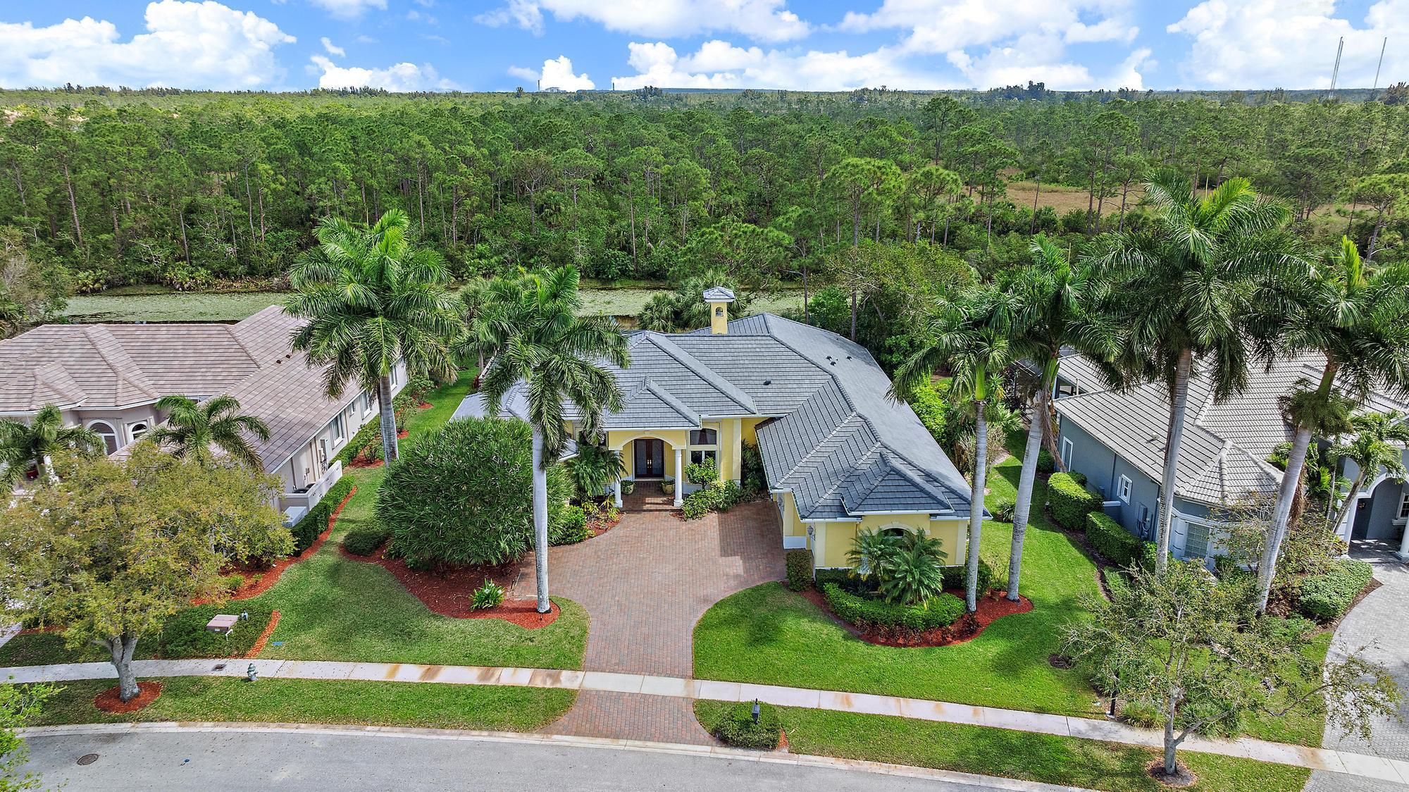 With 110 Feet of Preserve and Water Frontage, this exceptionally built and immaculately maintained 4BR/4BA+Den Estate offers unsurpassed privacy and tranquility within the world-class Club at Ibis. Custom built by Arch Enterprises, this estate boasts a 2025 ROOF, whole-house 40,000 Watt Generator, and state-of-the-art hurricane protection--Rolladen Accordian shutters and electric roll-down shutters in the front. Featuring premium, creamy 24x24'' marble flooring in the main living areas, and 2024-installed wood flooring in three bedrooms, this home exudes a timeless and elegant aesthetic throughout. This unique and versatile floor plan offers a dedicated wine room, a beautiful gas fireplace in the living room, and a handsome wood-paneled library. Extensive moldings, cove lighting, coffered ceilings and other architectural details provide luxurious touches throughout. The large, renovated kitchen features an enormous walk-in hidden pantry and 2022 stainless steel Wolf Professional Gas cooktop, Wolf 36" Oven, Wolf Speed Over (Convection &amp; Microwave), 48" Kitchen Aid Refrigerator/Freezer and matching Kitchen Aid Dishwasher. The primary suite offers two oversized walk-in closets, and an opulent bath adorned with stunning marble. The 3.5-Car garage is upgraded with a custom garage floor and full garage air conditioning added In 2024, rendering an additional 878 air conditioned square footage to the already 3,733 square feet under air. The indoor space and the outdoor space merge beautifully through the full-pocket sliding doors which open to the fully screened backyard. The architecture of the home, with its soaring ceilings and plentiful windows enhances the view of nature providing a unique opportunity to enjoy tranquil views of nature from the interior, and within a Platinum Club of America&#x14;the Club at Ibis. This property offers exceptional storage and illumination with custom lighting installed throughout. Pride of ownership is immediately apparent and ready for the most discriminating buyer. The Club at Ibis is an award-winning community that boasts a 90,000 sq. ft. clubhouse, three 18-hole Nicklaus-family Championship golf courses, five restaurants, a world-class fitness complex and spa, and incredible tennis and pickleball facility.