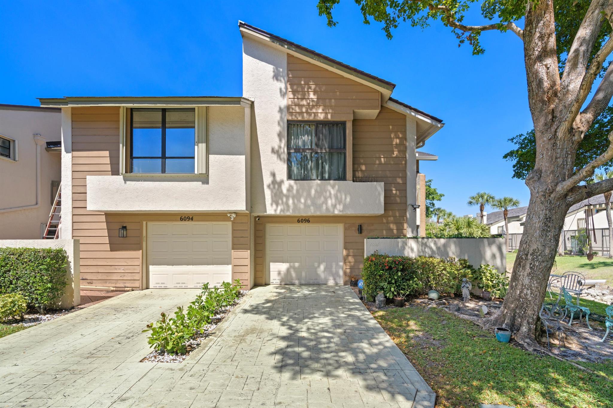 ABSOLUTELY GORGEOUS WATERFRONT TOWNHOUSE | PRESTIGIOUS IRONWEDGE | BREATHTAKING LAKE & FOUNTAIN VIEWS | END-UNIT | All Hurricane Impact Windows/Doors All Hurricane | Bright Open Floor Plan | LED Recessed Lighting | Skylights | Volume & Tray Ceilings | Eat-In Kitchen with Breakfast Bar | Butcher Block Counters | White Wood Cabinets | S/S Appliances | Wood Burning Fireplace | 2 Primary Bedrooms | Balcony | Ensuite Dual Sink Vanity | Large Glass Shower | Soaking Tub | Immaculate Manicured Landscaping | Open Patio | 1-Car GA | Driveway | Guest Parking |  Resort- Like Amenities, Community Pool | Hot Tub | Sun Deck | Clubhouse | Top A+ Rated Schools | Minutes to Beach,  FAU, Mizner Park & Delray Beach Atlantic Ave | Roof 2022 | AC 2022 | WH 2017 | PRESENT ALL OFFERS!