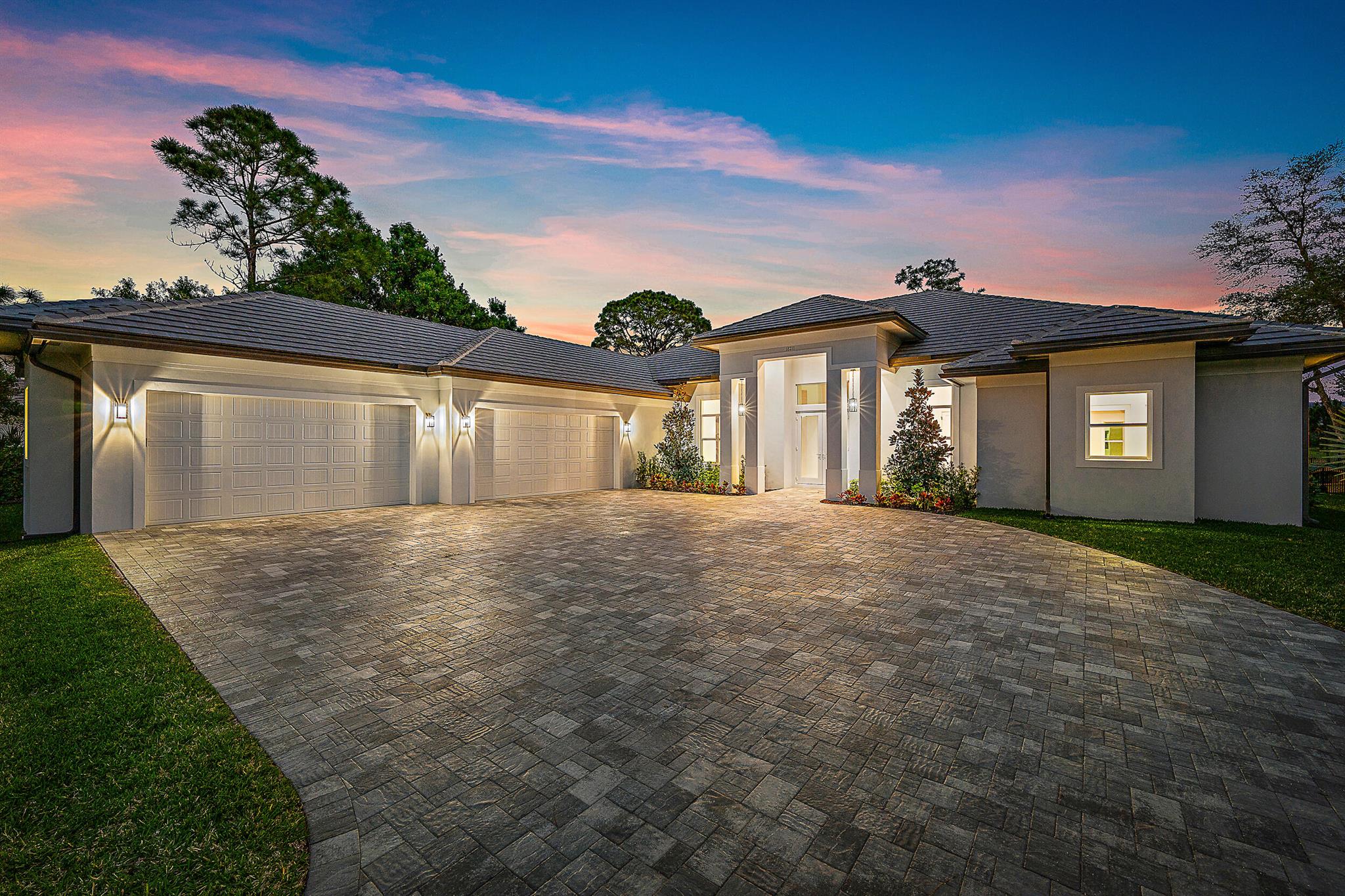 This newly built, one-story CBS home offers an exceptional living experience right on the Old Trail golf course. The open floor plan boasts high ceilings and impact windows and doors, blending style with security. The chef-inspired kitchen is a true standout, featuring double islands and stunning waterfall quartz countertops--perfect for entertaining. The thoughtful split floor plan provides privacy, with a spacious primary suite that includes two walk-in closets and a luxurious free-standing tub. Additional features include 3 bedrooms, an office, a formal dining room, and a cabana bath. Enjoy the peace of mind provided by a 24-hour secured gate, a low HOA fee, and optional membership opportunities.  Short-term, low-interest seller financing available.