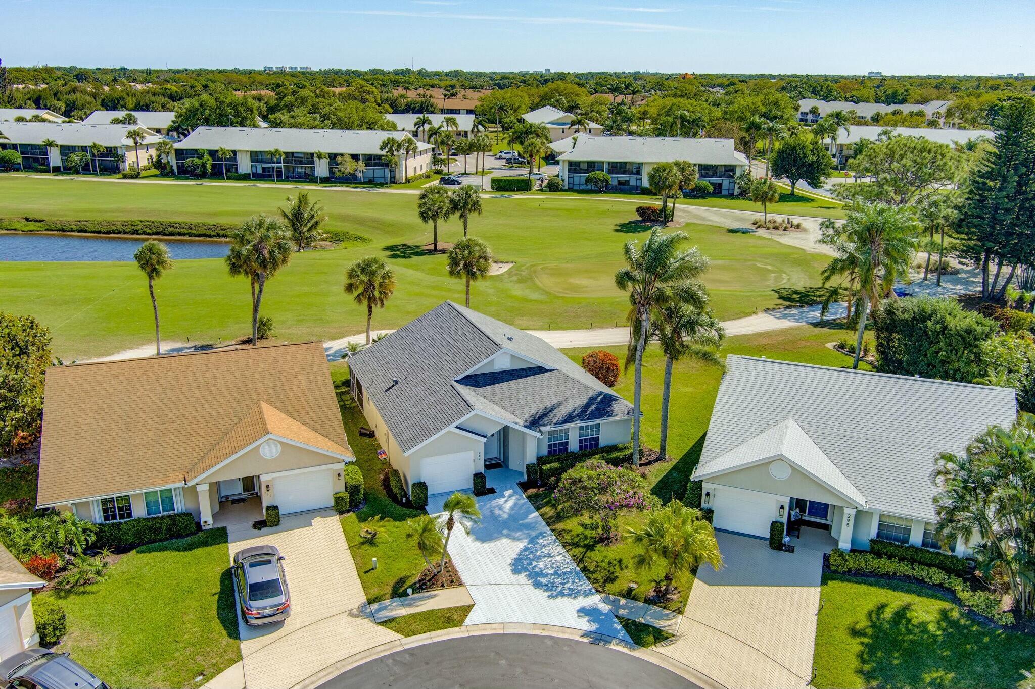 This Newly Updated 3BR/2BA Home Rests in the Highly Desirable Community of Eagle Ridge and Boasts New Roof, Impact Windows, New AC, New Floors, New HWH and More! Take in Breathless Views of Golf Club of Jupiter and Lake From Your Fully Screened-In Patio. Open Floor Plan with Vaulted Ceilings and Endless Natural Light Offers a Spacious Comfortable Environment. Kitchen Comes with Stainless Steel Appliances and Workstation. Large Primary Suite Has Walk-In Closets, Large Vanity and Private Shower. Family Friendly Environment Within an A-Rated School System. A Must See Home With Everything Done!