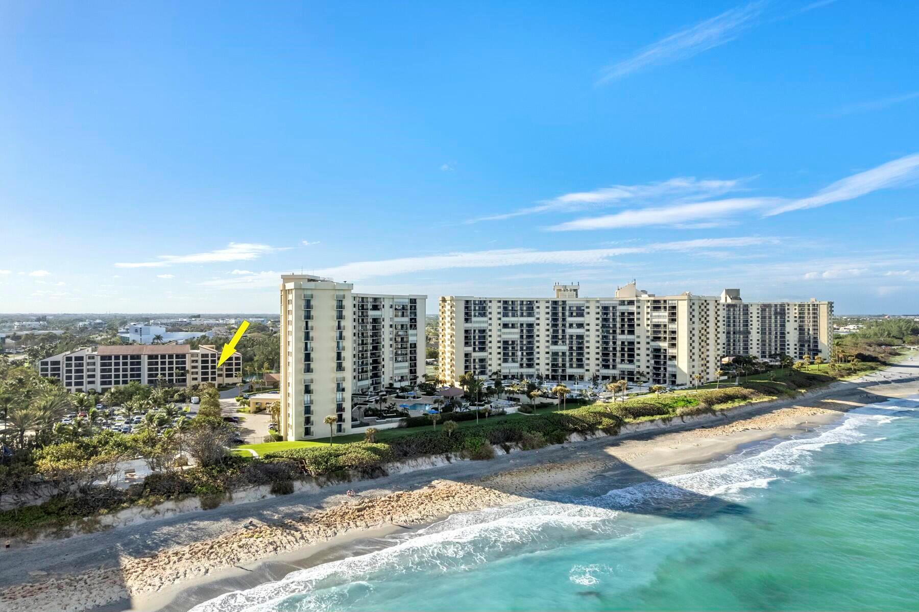 Location, Location! This Beautiful Corner Unit is in a prime location in Jupiter within the highly sought out Ocean Trail community. Turnkey Fully Furnished including Linens, Dishes and more. Renovated in 2021 with New AC, Luxury Vinyl Tile Flooring, Kitchen Countertops, Stainless Steel Appliances, New Paint, Fixtures, Window Coverings and High End Furnishings. This 2BR, 2BA condo boasts over 1600sf of living space plus add'l sqft on the oversized corner balcony and entry way courtyard with sitting area. Includes one covered parking space,  24 hour manned gate, Private entrance to the beach and Jupiter Beach Resort and Spa, Beautiful Sunrises, Tennis Courts, Fitness Center, and Pool. Seller will pay 1/2 of the HOA dues for the remainder of 2025,  and an amount toward HOA dues for 2026