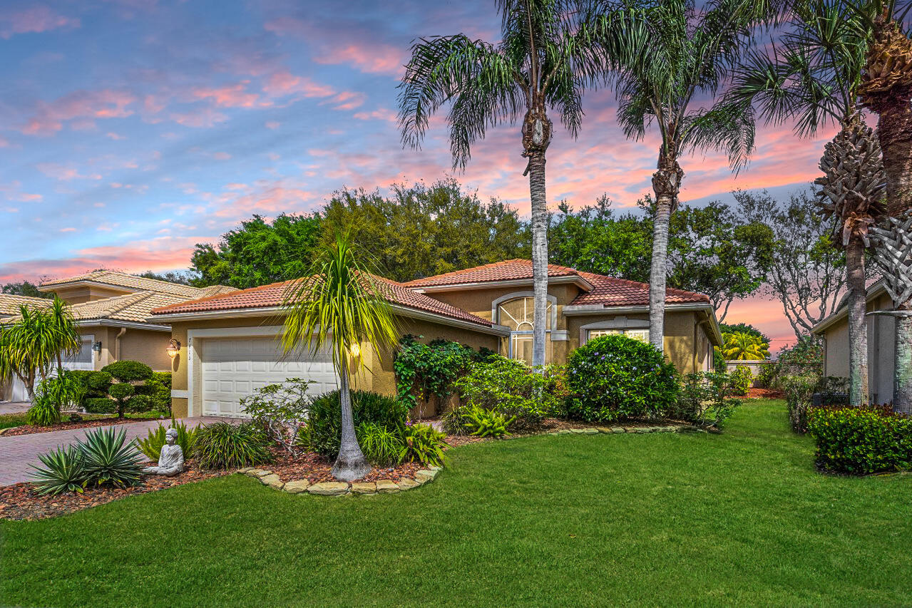 Beautifully updated & impeccably maintained 3 bedroom, 2 full bath single family home in highly sought after Valencia Pointe. If you're looking for a move-in ready home w/ ALL the bells &  whistles, look no further. This Isabelle model home w/ 1,782 living sq. ft. features an open floor plan w/ a gorgeous chef's kitchen, solid wood cabinets, new quartzite countertops, & top of the line appliances. Italian marble flooring throughout the main living area & engineered hardwood in the bedrooms. Additional upgrades include accordion shutters, 2018 a/c, 2022 hot water heater, a FULL HOUSE HOME GENERATOR, crown molding, custom closets, tasteful built-ins, frameless shower doors, an oversized screened in patio, & the list goes on. Valenica Pointe is a premier 55+ community w/ 5 star amenities!
