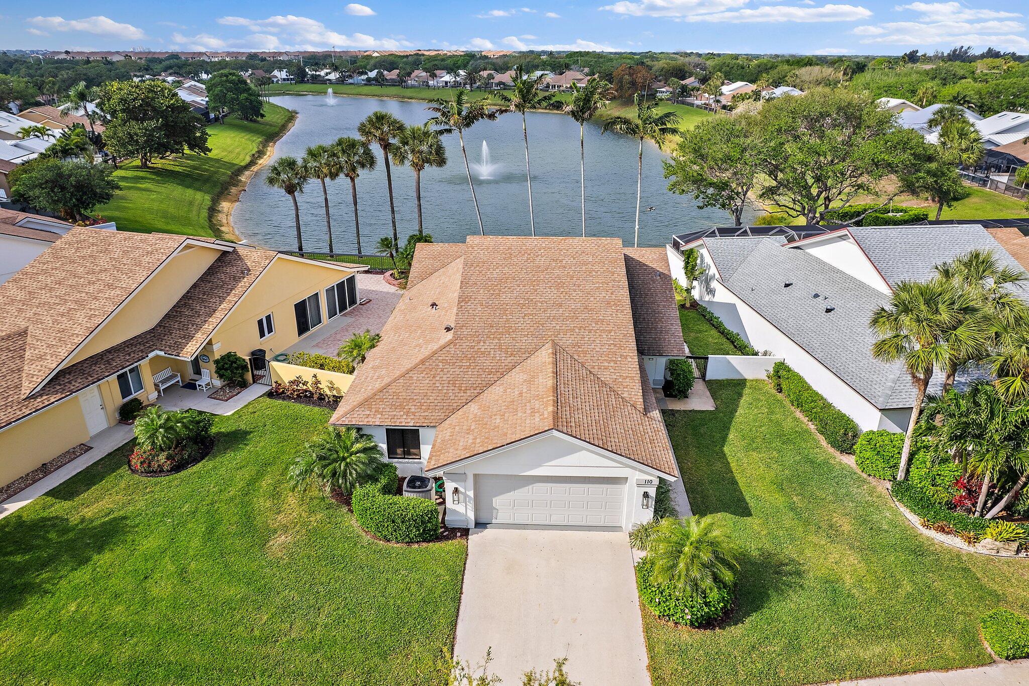Stunningly Renovated Lakefront Pool Home in The Ridge at the Bluffs! This exquisite rarely available waterfront home on a larger lot offers the perfect blend of luxury, location, and lifestyle. Ideally situated within walking distance to the beach and it boasts breathtaking lake views and spectacular sunsets right from your backyard. Renovated this year, this home features a brand-new kitchen with high-end appliances, beautifully updated bathrooms, new flooring throughout, and a newly refinished pool deck.Designed for both comfort and style, the open-concept floor plan is bright and spacious, with abundant natural light enhancing the main living areas. Short walk to the resort-style amenities within the community, including Pickleball, Tennis, Basketball, and a beautifully