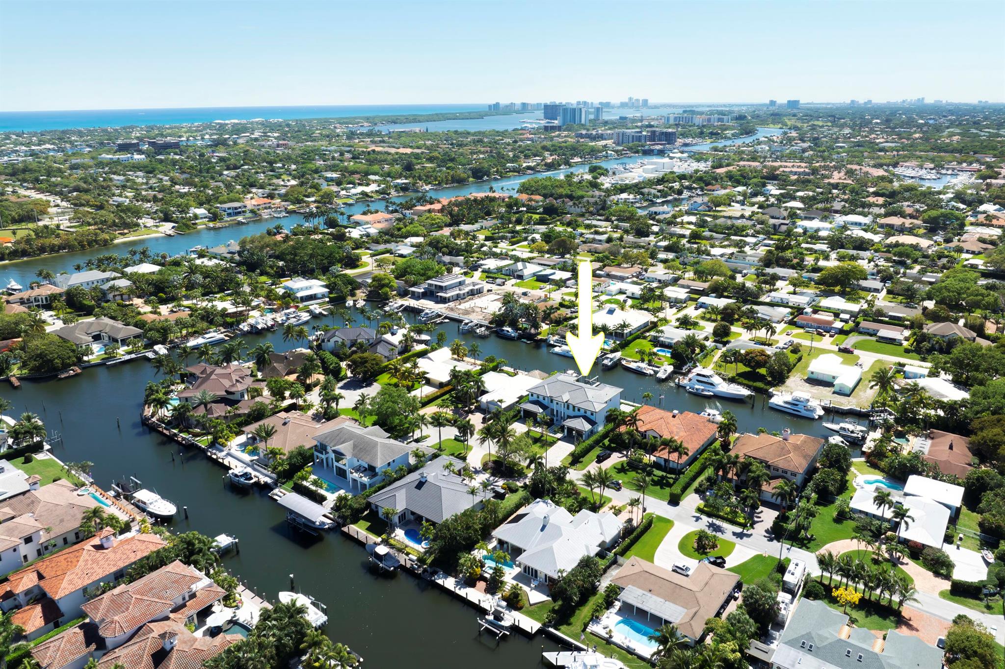 This extraordinary new-construction waterfront estate offers a refined lifestyle of sophistication, elegance, and seamless indoor-outdoor living. Designed with meticulous craftsmanship and cutting-edge architecture, the residence spans 6,504 square feet of living space and 8,465 square feet in total. Every detail has been carefully curated to provide an atmosphere of effortless luxury in one of Palm Beach Gardens' most sought-after waterfront communities. With direct ocean access and no fixed bridges, this property is a boater's paradise, offering 95 feet of prime water frontage on a deep, extra-wide canal. The estate combines breathtaking water views, a contemporary coastal aesthetic, and state-of-the-art technology, making it the perfect retreat for those seeking both luxury and convenience.
A dramatic entryway welcomes guests into a grand, open-concept living space, where floor-to-ceiling sliding glass doors allow natural light to flood the interior. The great room and dining area create a seamless flow, designed for both intimate gatherings and large-scale entertaining. High ceilings and custom-built features enhance the sense of grandeur, while stunning waterfront views provide an elegant backdrop to everyday living.
The gourmet chef's kitchen is a masterpiece of design and functionality, equipped with top-of-the-line appliances, including a Wolf gas range, 30" convection Wolf microwave, Subzero refrigeration, two Cove dishwashers, and Cristallo waterfall-edge countertops. Custom oak cabinetry and a concealed butler's pantry with additional refrigeration, a Miele coffee station, and a Viking microwave offer both beauty and practicality. This kitchen is designed for those who appreciate fine dining and entertaining in effortless style.
The primary suite is a private sanctuary, offering expansive his-and-her walk-in closets, a spa-inspired bathroom with dual showers, a soaking tub, and Taj Mahal countertops. A morning bar with a Subzero beverage cooler and Miele coffee station adds a layer of convenience, while private balcony access provides serene waterfront views. Thoughtfully designed with comfort in mind, this retreat embodies tranquility and sophistication.
Designed for outdoor entertaining, the backyard offers a resort-style oasis with a 50-foot heated saltwater infinity pool and spa, marble paver decking. Covered verandas on both levels provide shaded areas for relaxation, complemented by ceiling fans that bring a cool tropical breeze. A fully equipped summer kitchen with a built-in gas grill, sink, and refrigerator ensures effortless outdoor dining.
For the avid boater, this property offers an exceptional waterfront experience. A newly constructed seawall with batter piles and heavy-duty Vanguard sheet piles ensures durability, while the 70-foot composite dock and 30,000-pound High-Tide boat lift with quad motors provide the ultimate convenience. With no fixed bridges and direct access to the Intracoastal Waterway just 350 yards away, this home offers one of the finest boating locations in South Florida.
Luxury extends beyond design with smart-home technology and high-end features throughout. The estate includes an air-conditioned bonus room perfect for a tackle room or gym, two oversized two-car garages with 13-foot ceilings to accommodate car lifts, and two laundry rooms equipped with double LG washer and dryer pairs, a freestanding steamer, and custom cabinetry. Large-format Italian porcelain tile flooring downstairs and hand-scraped engineered wood upstairs add warmth and style, impact-resistant hurricane windows and doors, and a dual-zone climate-controlled 489-bottle wine cellar enhance both security and comfort. Generator-ready infrastructure with installed transfer switches.
Palm Beach Gardens offers a lifestyle of prestige, combining luxury waterfront living with world-class golf courses, fine dining, and exclusive shopping. Pristine beaches, elite yacht clubs, and convenient access to Palm Beach International Airport make this location one of the most desirable in South Florida. Whether as a primary residence or seasonal retreat, this home presents an unparalleled opportunity to experience coastal living at its finest.
This brand-new waterfront estate is designed for those who demand the best in craftsmanship, location, and lifestyle. With a one-year builder warranty included, this is an investment in both luxury and lasting value.