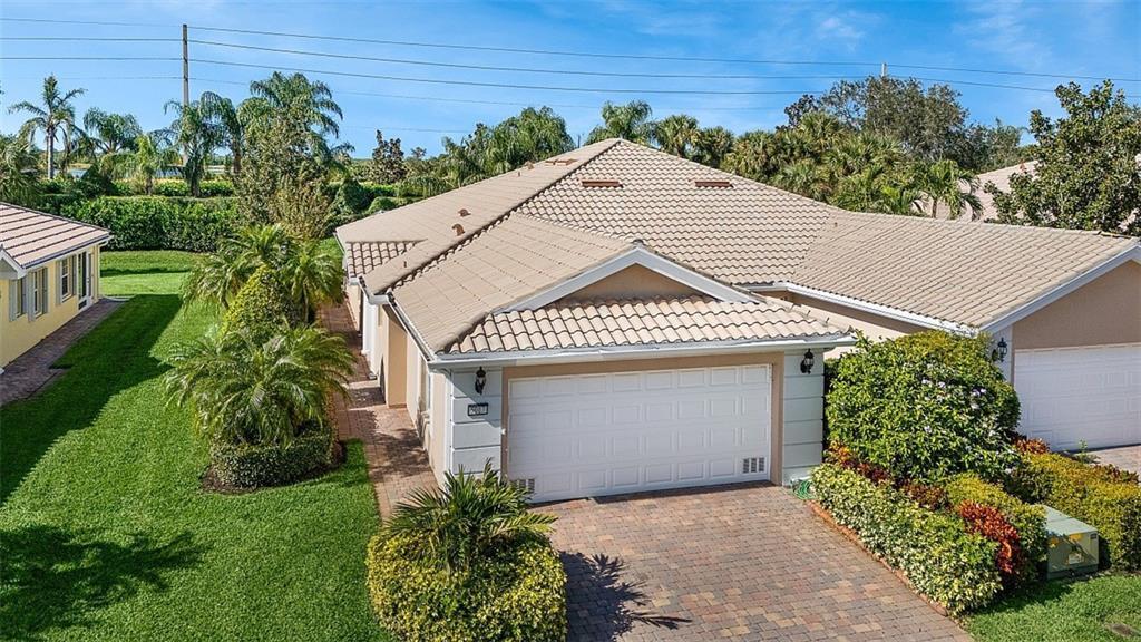 Divosta CAPRI extended model - 2 BD/2 BA Villa in the resort style living community of the Isles @ Waterway Village. All IMPACT Windows, a rare find, for a true Lock-n-Go! White Cabinets, Granite Countertops in kitchen, plantation shutters, upgraded lighting & fixtures, new refrigerator, 2019 HVAC, newer HWH, walk-in shower in primary bathroom; split bedrooms w/privacy doors for guests; privacy walls and a safe room. Recreational facilities include clubhouse, heated pool, tennis/pickleball courts, fitness center, gathering social area. Conveniently located to shopping, dining and the BEACH.