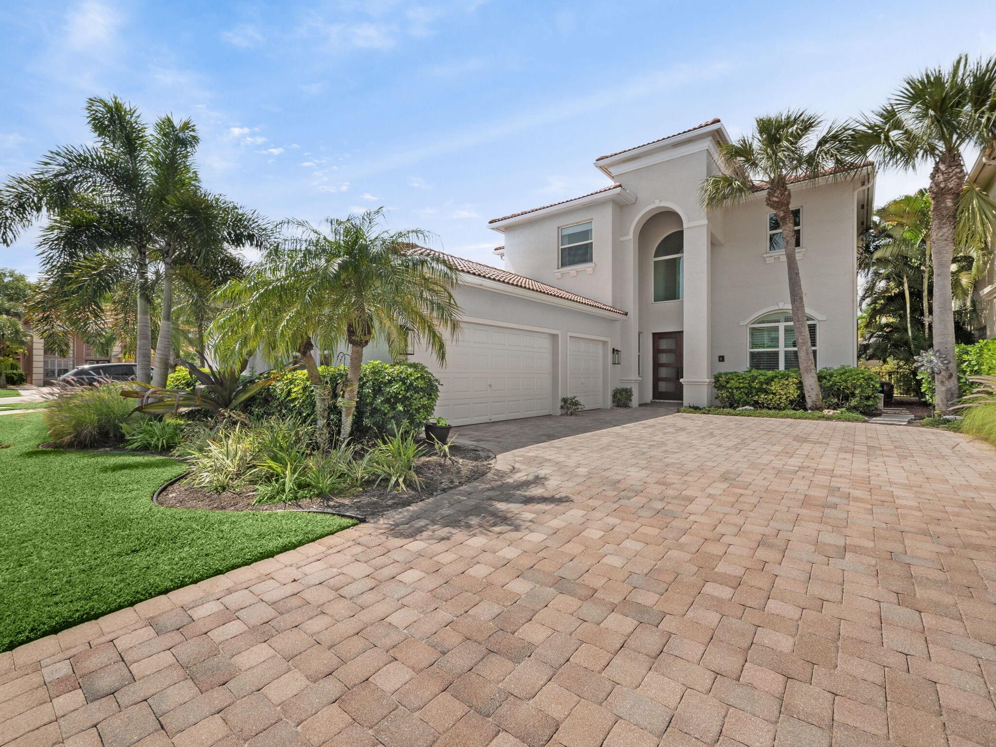 Located in the highly sought-after gated community of Mirabella, this Laguna model is situated on a private cul-de-sac and offers 5 bedrooms, 3 full bathrooms and a 3-car garage. Designed for both comfort and style, this home features hurricane impact windows and a Brazilian Mahogany hurricane impact front entryway door system. These upgrades provide both peace of mind and energy efficiency throughout. Inside, you'll find rectified porcelain tile floors, a renovated kitchen with ample cabinetry, stunning quartzite countertops, and top-of-the-line stainless steel appliances. The updated pantry even includes a hidden coffee bar. On the main floor you will find an additional bedroom (or playroom/office) with new carpet along with a full updated bathroom. Step outside to your private tropical oasis, featuring a large covered lanai and a resurfaced oversized pool with waterfall features, perfect for entertaining. 
The long brick paved driveway leads to a 3-car garage which offers plenty of parking and storage. The custom-designed landscaping enhances the home's curb appeal. 
Upstairs you will find newly installed carpeting and the large primary suit with a walk in shower, his/her vanities, soak tub and a walk in closet. Three additional bedrooms and one full bathroom are upstairs as well (2 of which have updated custom closets). 
Recent updates include AC units from 2020 and 2013 and a brand new water heater (2024). Nest thermostats, wi-fi connected garage doors and oversized newer washer/dryer. 
Mirabella features a clubhouse, newly renovated pool, playground, kid's room, four har-tru tennis courts, and a fitness center. Zoned for A-rated Marsh Pointe Elementary, just minutes away. 
Don't miss out on this incredible opportunity!