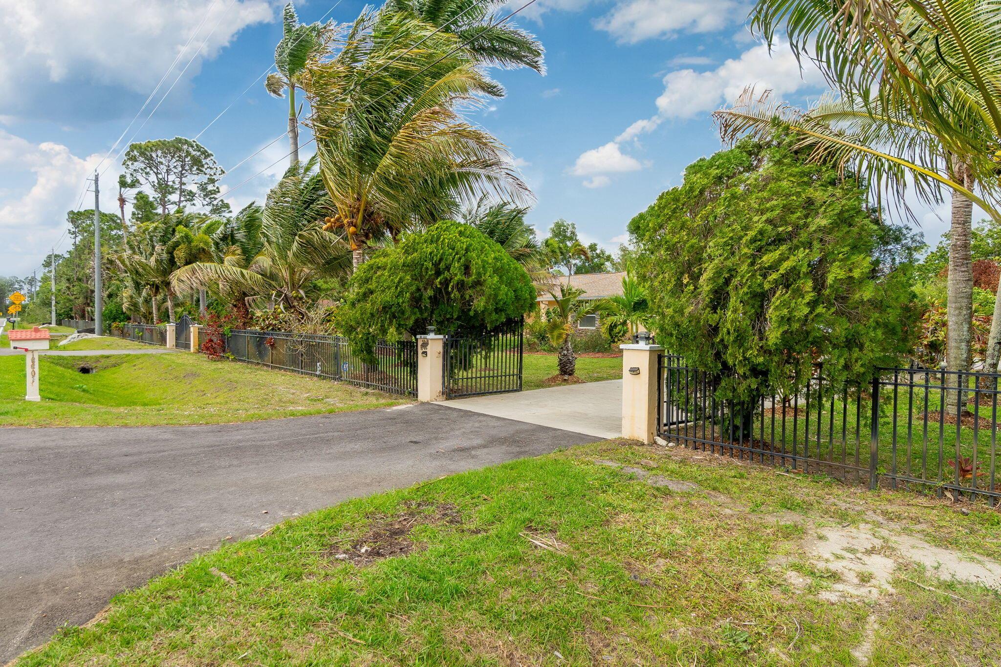 Whether you're looking for a serene escape or a place to call home, this property has it all. Enjoy cozy evenings in the bright and airy living room or step outside to your private backyard oasis. The covered patio and outdoor kitchen creates a perfect setting for family gatherings and relaxation by the pool. The home also features 4 bedrooms, 3 full bathrooms, a flex room, a formal dining room, and living room equipped with a fireplace. Bring your entire family and enjoy the large open-concept kitchen adjacent to the family room. The huge 1.25-acre lot has room to host all of your vehicles, work trailers, boats, RVs, motorhomes, and all of your furry companions. Don't miss this rare opportunity to own a piece of paradise. Welcome Home To Your New Private Retreat!! Call a REALTOR today!!!