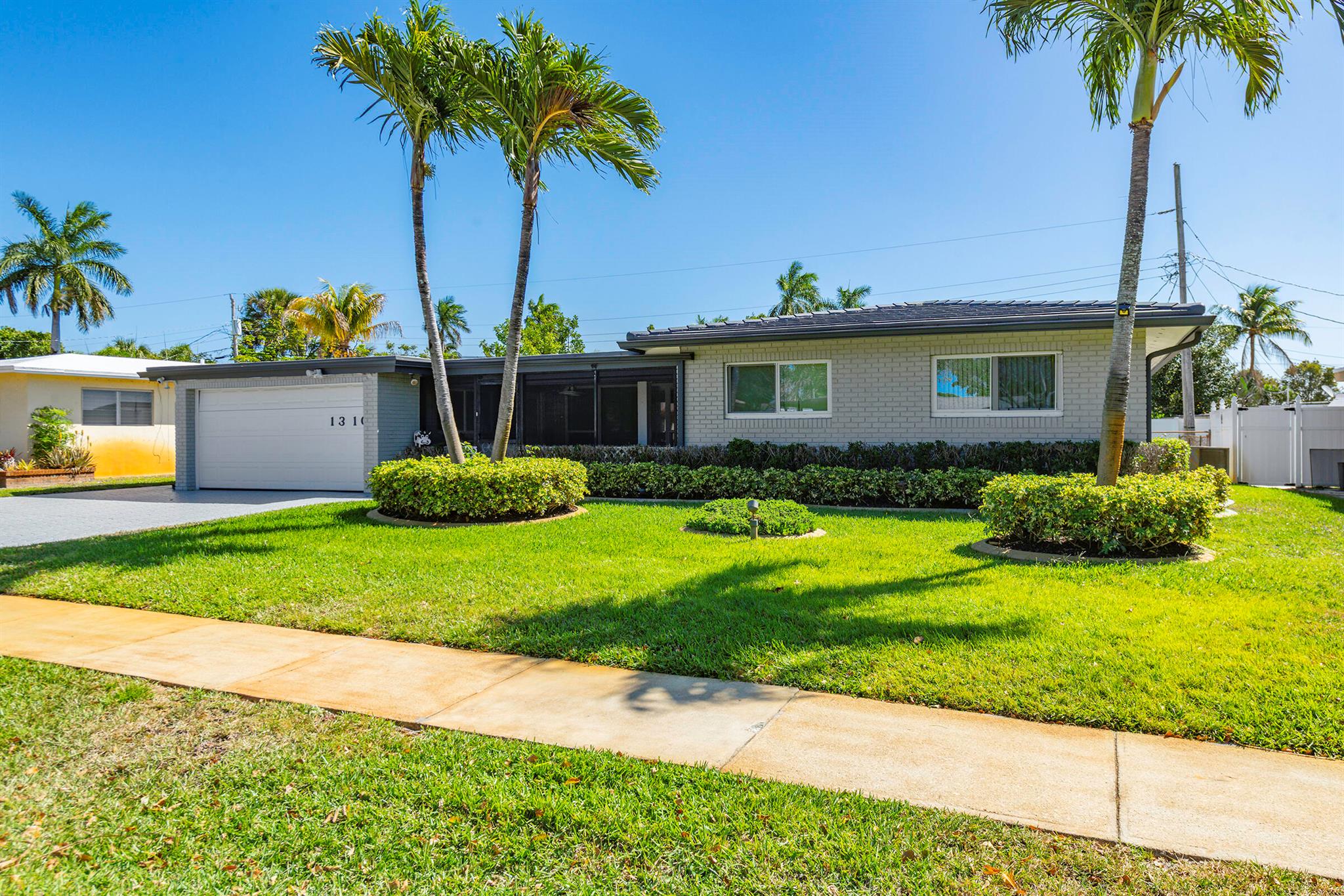 Discover this charming 3-bedroom, 2-bathroom home in Pompano Beach's desirable Lyons Park neighborhood. Brimming with character and potential, this home features an updated kitchen and bathroom, a spacious 2-car garage, and newer impact windows for added efficiency. The generous living spaces offer a blank canvas to create your dream home. Ideally located just minutes from great schools, beautiful beaches, parks, shopping, and dining! Don't miss this is a fantastic opportunity to own a piece of Pompano Beach living!