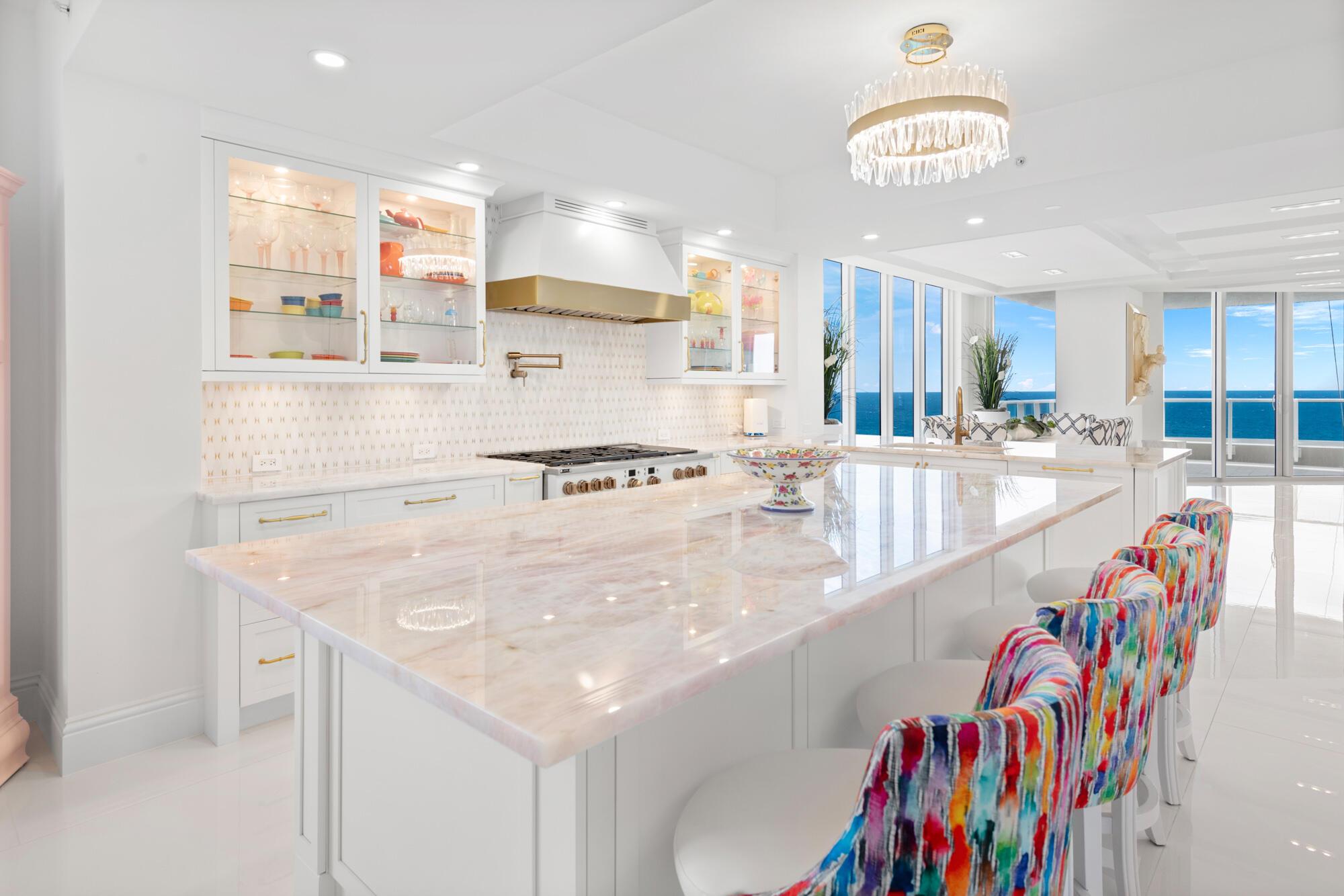 This fully renovated high floor residence at Oceans Edge, Singer Island, offers a luxurious living experience with no expenses spared. Elevator into private residence. 2 parking spots next to elevator. With a generous redesigned size of just under 4,000 square feet, 4 Bedroom, 4.5 bath, this residence provides ample space for the sought after South Florida lifestyle. The expansive balconies not only provide stunning views of the Atlantic Ocean and Intercoastal but also enjoy tropical breezes and the ambiance of coastal living. Entire north side of the 14th floor is incredible. The warm turquoise waters below and white sandy beaches are the definition of true relaxation Breathtaking sunrises and sunsets, this residence offers unforgettable views. Beautiful Wolf Appliance, chefs kitchen, natural gas, high ceilings, open floor plan, huge closets. World class amenities, 2 pools, steam room, sauna, brand new oceanfront club room and a manned gate. Located just a short 5 minutes drive away from PGA Blvd... for convenient access to the best restaurants and shopping. Just minutes away form the best golf courses in South Florida and just a short drive to Palm Beach Island. Scuba, Fish or Snorkel from your oceanfront backyard.

Private FBO 15 minutes and new Brightline Train station 15 minutes.