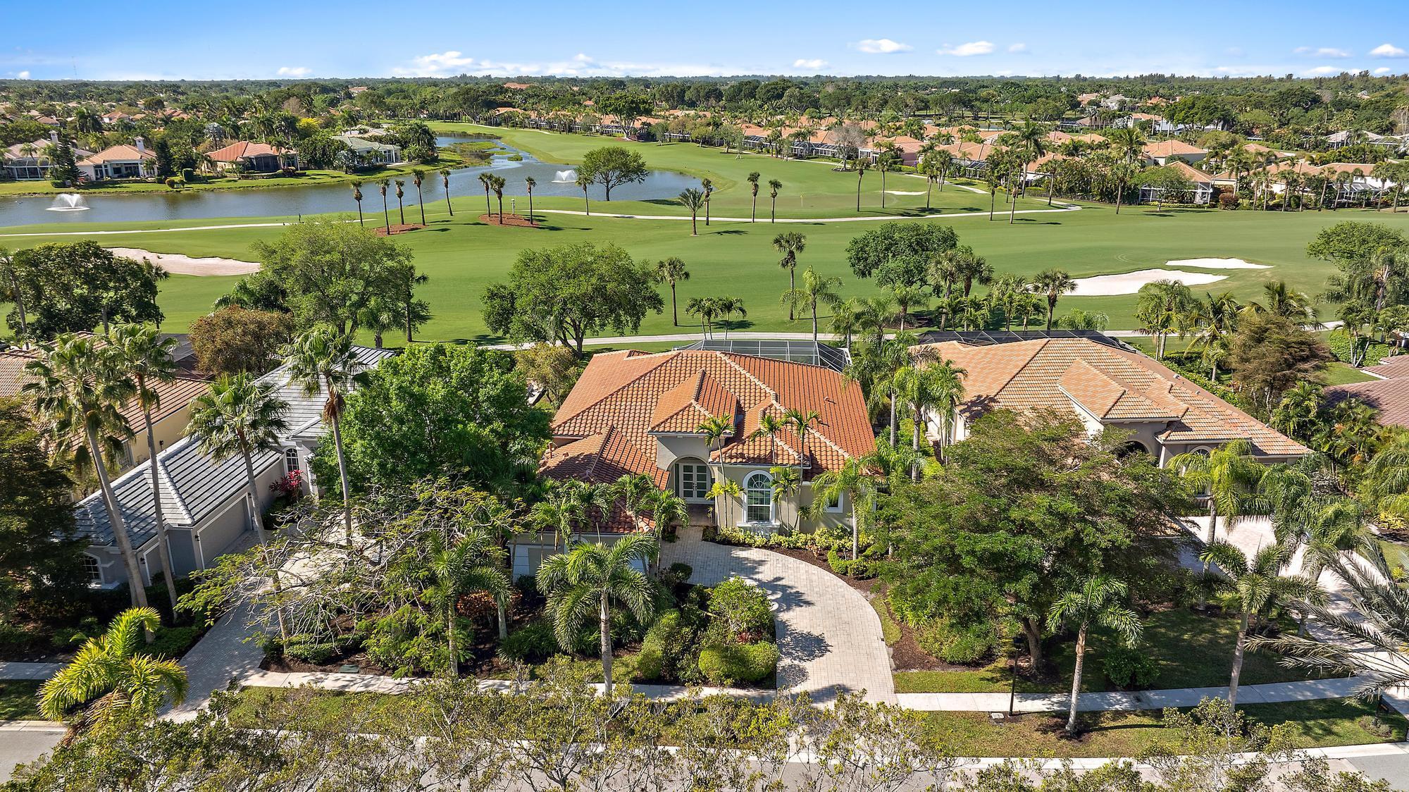 IMMEDIATE PREMIER GOLF MEMBERSHIP AVAILABLE WITH THE PURCHASE OF THIS HOME. FULLY RENOVATED and OFFERED FURNISHED this 4BR/4BA+Den is light, bright, modern and ready for fabulous Ibis living on Day 1. Boasting a 2022 ROOF and 2022 IMPACT WINDOWS and DOORS throughout, everything has been redone. Sleek, white porcelain tile flooring throughout and an reimagined/opened up floor plan creates a South Beach Chic and wonderful outdoor living space in the wonderfully located Ibis Isle neighborhood at the Club at Ibis. The shows-topping living room statement wall is unique and timeless, giving a luxurious and modern first impression. Designer window treatments and light fixtures in every room help create a fully realized contemporary design. Enjoy the best of Florida living with an over-sized lot overlooking the 7th fairway of the brand new, Nicklaus-designed Heritage Course. The enormous screened enclosure and covered lanai allows for dining al fresco and outdoor relaxation. The remodeled pool features a 2022 pool heater and the two HVAC units were replaced in 2024 and 2019. The Club at Ibis is an award-winning community that boasts a 90,000 sq. ft. clubhouse, three 18-hole Nicklaus-family Championship golf courses, five restaurants, a world-class fitness complex and spa, and incredible tennis and pickleball facility.