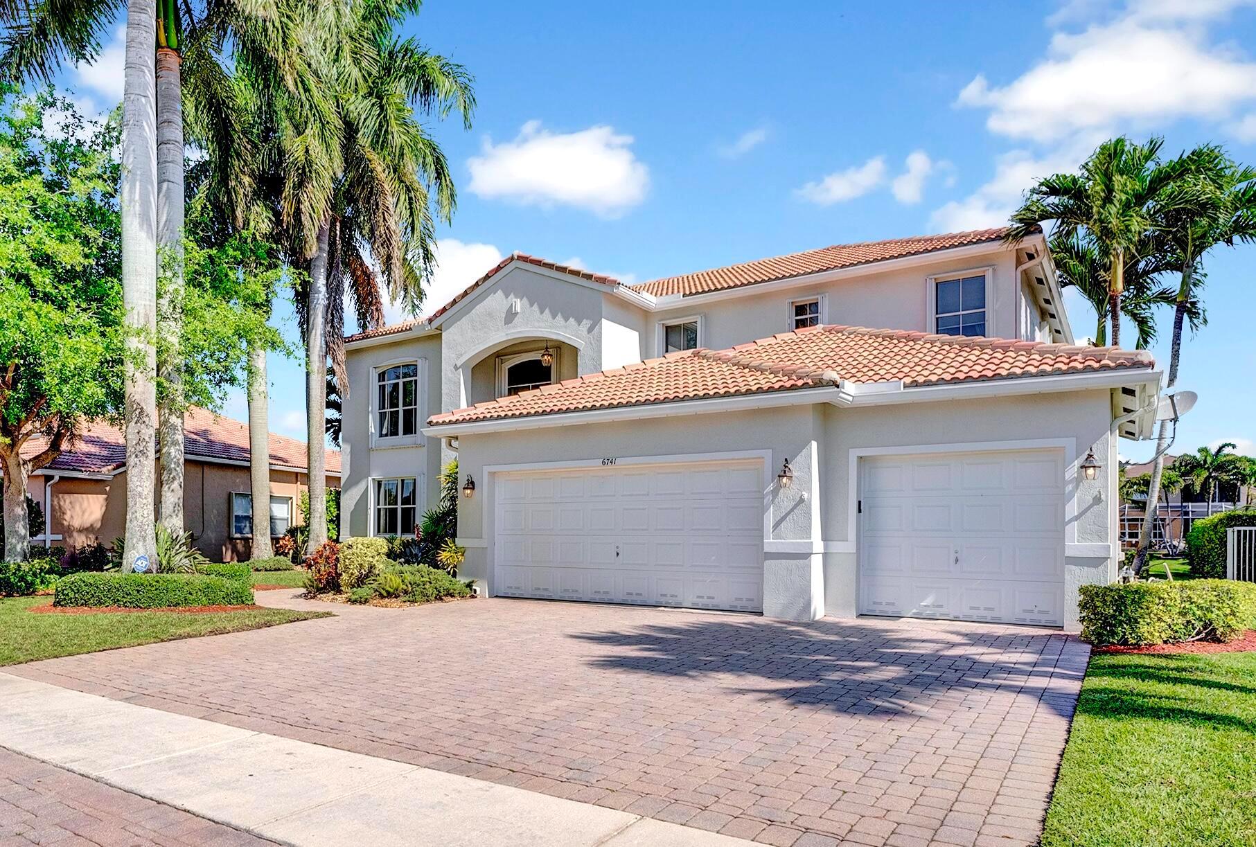 Photo 1 of home located at 6741 Finamore Circle, Lake Worth FL