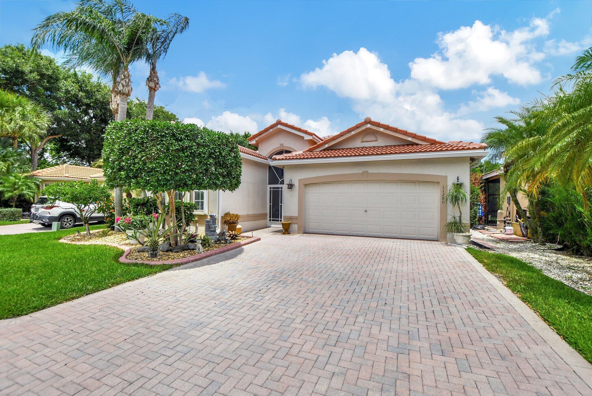 BRAND NEW ROOF 2025!!  Pool Home!! Photos not current decor new photos coming soon. Stunning Superior Upgraded Mediterranean 3 model w/huge salt water pool heated by solar panels. Equipped w/outdoor kitchen, propane gas. Very rarely do you find all this outdoor living! Pool has a decorative fountain. Chef's kitchen w/high quality Antique White Upgraded 36'' cabinets, large pantry, SS Appliance package, built in microwave, upgraded stove fabulous cook block with electric, attractive granite, full backsplash. Primary Bath offers Whirlpool tub & Accordion hurricane Shutters! Bedrooms tiled, no carpet in home. Cul-de-sac lot. Solar Panels heat the pool, they were originally installed approx. 7 years ago and were re-installed with the new roof approx. 9 months ago. Large outdoor living space Rare out-door kitchen with all the bells &amp; whistles, quick fire grill &amp; propane tank. Non slip pool finish. There are 2 gates to exit the pool. Inside the home there is an outstanding Chef's kitchen. Antique white upgraded cabinets, large built-in pantry, undermount lighting. Microwave is tucked in neatly behind a cabinet door. Moldings surround the entire kitchen and there is an attractive cook block with electric on both sides and cabinets for extra storage. Upgraded granite countertops, full tile backsplash complete with pull outs. Front Hallway offers textured paint with modern lighting, double door entry &amp; birdcage. Second Bathroom was upgraded to a walk in shower with floor to ceiling tile, attractive listello inserts, quality bathroom counter with upgraded lighting. Second bedroom offers plantation shutters &amp; custom fitted closet. Crown moldings throughout this home. Washer &amp; dryer are Bosch front loaders &amp; laundry room equipped w/large 36" cabinets for more storage. Third bedroom has pocket doors and a wall to wall custom desk with dual computer stations &amp; shelving. Home offers tinted windows, upgraded owned security system w/motion detectors, tile on diagonal w/decorative front entry floor inserts. Built in cabinets in garage for more storage. Primary Bedroom has upgraded glass sliders to enhance the pool views &amp; two extra large closets in primary bedroom which are custom fitted plus towel closet. Primary bath equipped with whirlpool spa, frameless shower doors w/listello decorative inserts, private commode w/pocket door, dual sinks &amp; granite counters. Formal living room &amp; dining room complete w/custom valences throughout. One of a kind! Wont last long. Come live the country club lifestyle without paying country club fees. Clubhouse currently under renovation &amp; assessment was paid for by seller. Valencia Lakes offers a cafe, professional entertainment, billiards, state-of-the-art fitness center, a library, sauna, spa, tennis courts galore, pickleball plus two resort style pools, plenty of games and even a fishing pier. There is entertainment for anyone that desires! Lots to do to stay busy. Come live the dream!