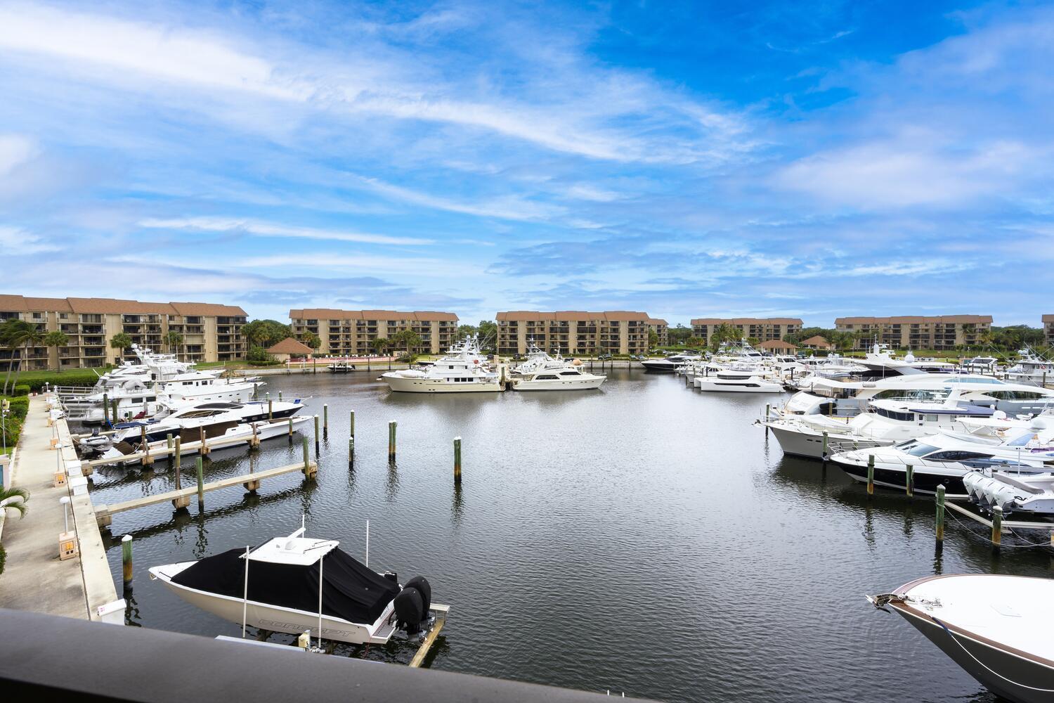 Come and enjoy this beautiful 2/2 condo with spectacular views overlooking the Marina in the desirable River at the Bluffs community.  Remodeled in 2023 this is the perfect location for your year round or seasonal home.     Located convenient to Jupiter Beach, Juno Pier, restaurants, grocery stores and, shopping. Bring all offers, sellers are motivated to sell so act quickly.
