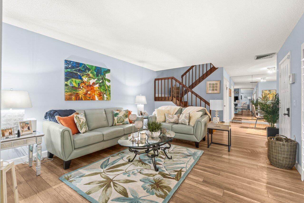This beautifully maintained unit just minutes from the stunning beaches of Juno, Jupiter, and Singer Island, this home offers unbeatable access to the best of Palm Beach living. Conveniently located near PGA National Golf Resort, The Gardens Mall, Palm Beach State College, Trader Joe's, Fresh Market, Publix, and both the I-95 and Florida Turnpike on-ramps. Interior features include sleek Stainless Steel Samsung appliances, wide-plank luxury vinyl flooring in the main living areas, and a private fenced courtyard perfect for relaxing or entertaining. Come see for yourself how effortless it is to enjoy the Palm Beach lifestyle of luxury and convenience.