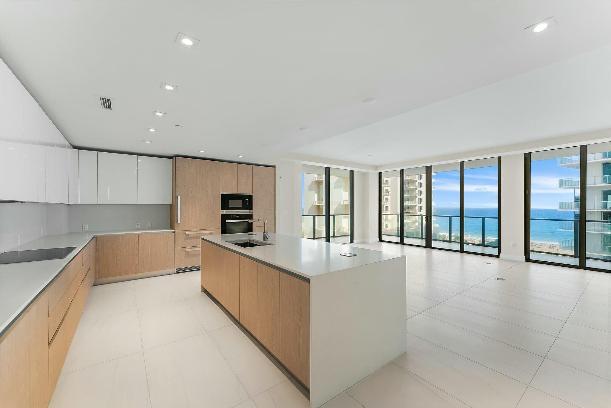 The absolute BEST value in the entire Amrit Development! This elegant corner unit features the largest floor-plan offered with views of both the ocean and intracoastal! This oceanfront residence epitomizes contemporary elegance and luxury living at the Amrit Ocean Resort & Residences. Offering breathtaking views and unparalleled amenities, this condo is the epitome of sophistication and comfort. Wake up to unforgettable sunrises at this stunning Singer Island retreat, where casual elegance meets unmatched luxury. The flow-through floorplan features two bedrooms and a fabulous den/office that can easily serve as a third bedroom. Also Available for ANNUAL UNFURNISHED RENT.