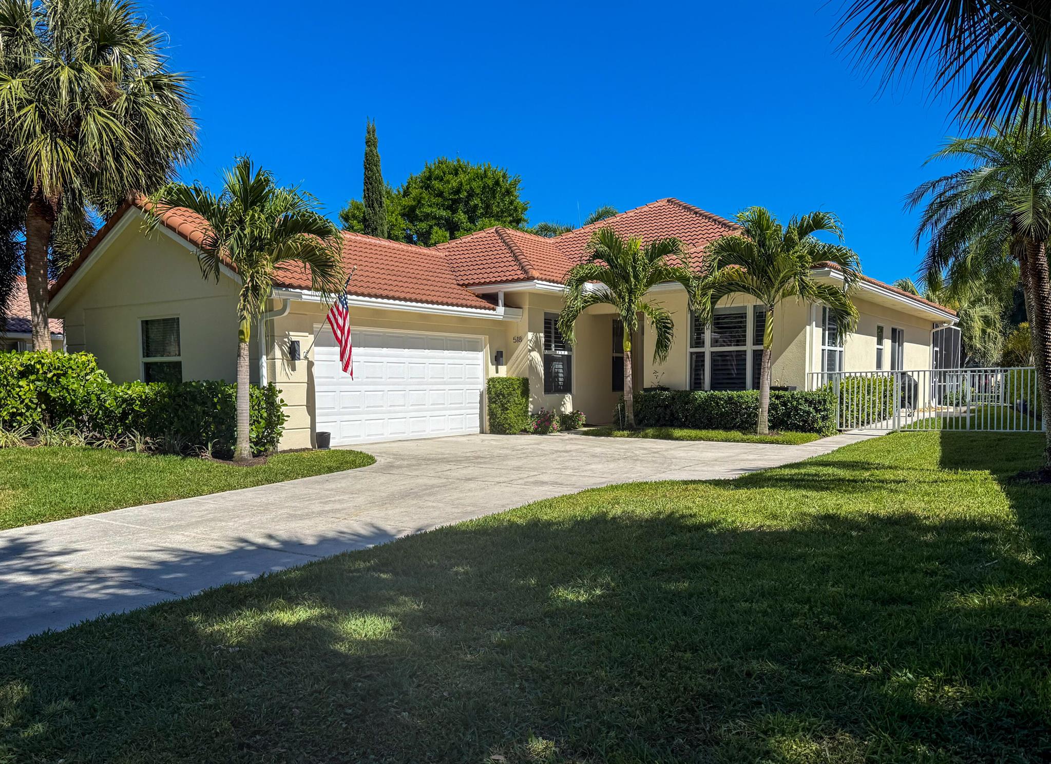 THIS ONE CHECKS ALL THE BOXES!!! Numerous INTERIOR & EXTERIOR UPDATES like lush landscaping, updated roof, 3 impact skylights & gutters,Impact Windows & Doors,freshly painted, Picture Frame Screen Enclosed SaltH2O Pool w/swim-up table(2021), overlooking yard w/lovely lake views, & room 4 Adirondack Chairs &/or hammock, a fence enclosed X-tra Large SideYard & a side patio...All ideal 4 grilling, alfresco dining, entertaining & enjoying the FLA LIFESTYLE+Wait til U R inside...Here U'll find open, light, bright spaces,soaring ceilings, Updated Kitchen w/sea of Scrumptious Quartz Counters, SS appliances, Wine/Bev Fridge,Spa-like Baths, Lovely Seamless Wood-Look Tile, Plantation Shutters, new doors, hardware, moldings, magnificent natural light inside & GR8 Sun Exposure out+++ Don't Walk-Run!