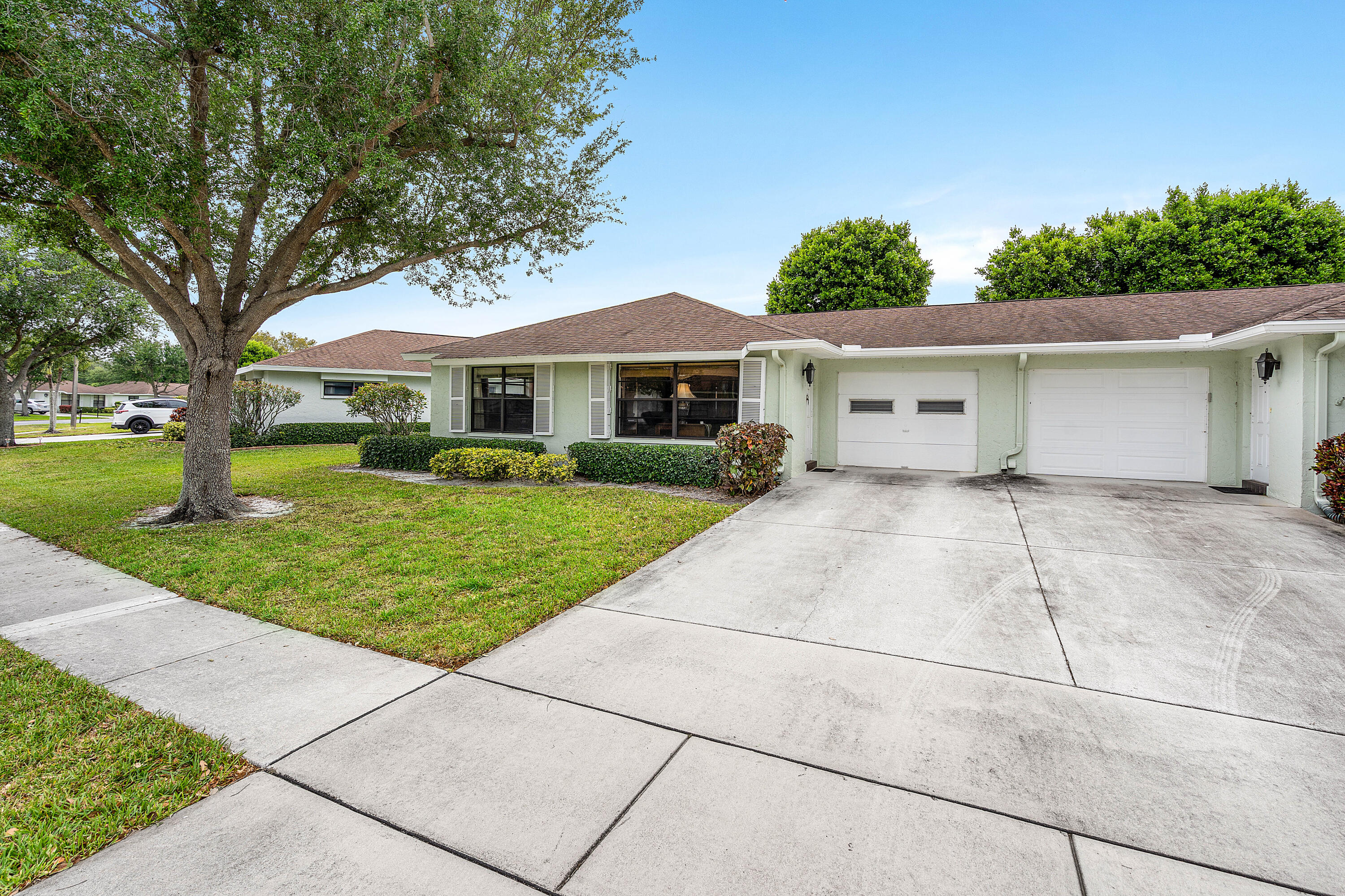 Check out this villa in a Active Community. Plenty of space for parking. Tile flooring throughout. Community offers a saltwater pool, clubhouse, library, and many social clubs. Association fees cover cable, water, sewer, trash, roof/gutters, landscaping, and exterior building maintenance.  Close to shopping, restaurants, movies, and hospitals. There is a no-renting policy for two years. and you can have 1 pet. Motivated Seller bring all offers.