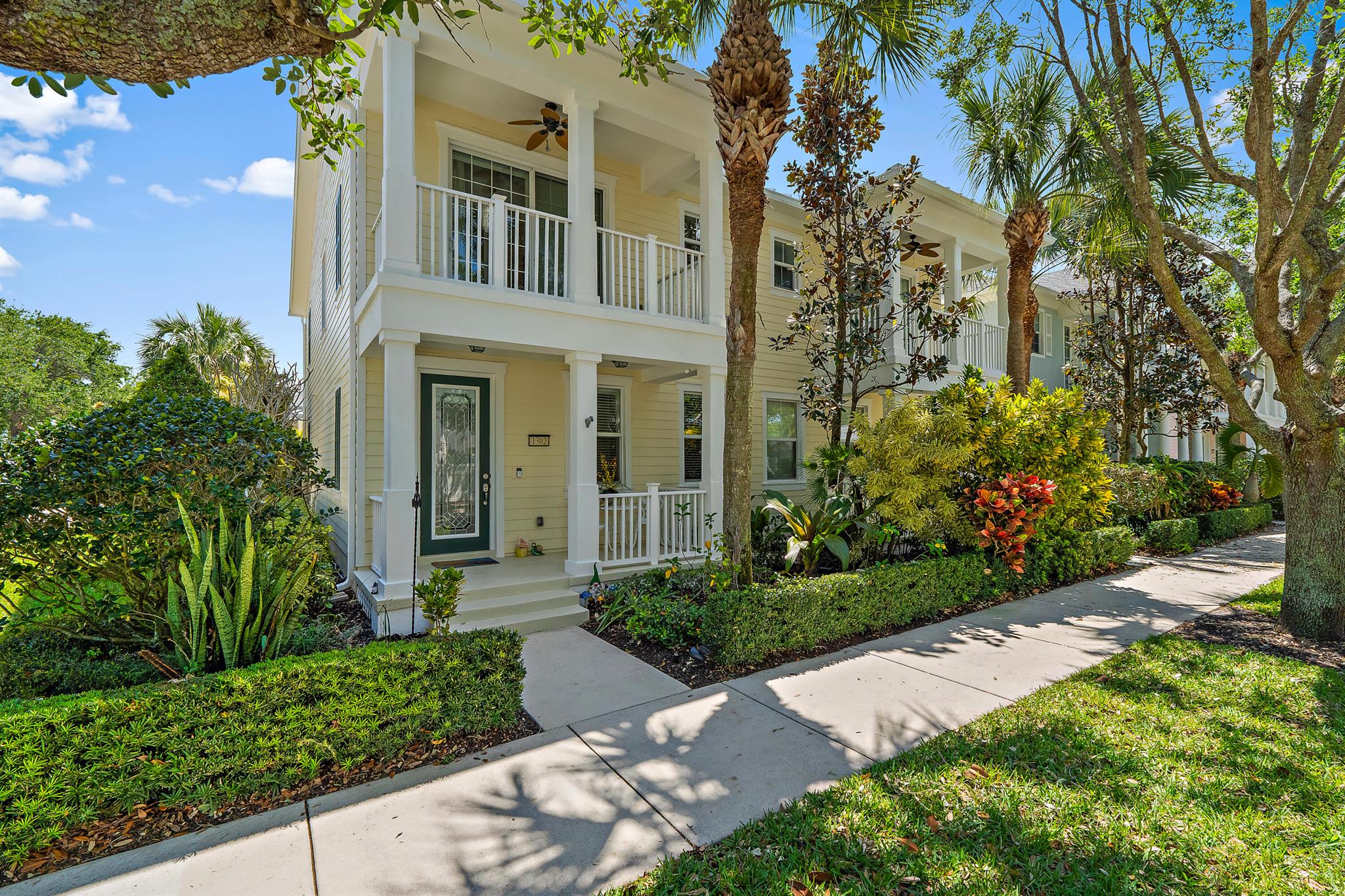 Welcome to this beautifully maintained Nautica model townhome in the highly sought-after Mallory Creek community of Abacoa! Offering 3 spacious bedrooms, 2.5 baths, and a 2-car garage, this home blends comfort, style, and location in one perfect package. Enjoy peace of mind with full impact glass protection, a newer HVAC system (2021), hot water heater (2022), and modern appliances just a few years old.Upstairs, you'll find engineered wood flooring throughout, adding warmth and sophistication to the private living spaces. The primary suite features its own private balcony--perfect for sipping your morning coffee or winding down at sunset while soaking in the peaceful, tree-lined views. Located just steps from the community's main clubhouse, you're perfectly positioned to enjoy resort-style amenities including a sparkling pool, game room, yoga room, and fully equipped fitness center. Plus, Mallory Creek offers a second pool for added relaxation and convenience.

The monthly maintenance fee covers landscaping, cable, high-speed internet, exterior painting, and access to all of Mallory Creek's exceptional amenities.

Don't miss the chance to live in one of Abacoa's most desirable neighborhoods&#x14;schedule your private showing today!