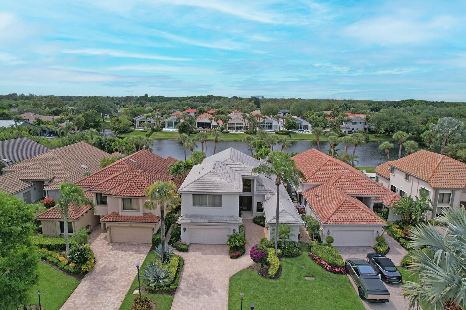 Exceptional 4 bedroom plus den, 6.5 bath home offered with over 3500 sq ft of living space in the desirable community of Frenchman's Creek. Indulge in the serenity and calm of the breathtaking lake views while relishing in the amazing Florida sunsets daily. These perfect views can be seen through the wall of windows lining your entertaining space.Sold furnished and move in ready. Schedule your private showing today!Frenchman's Creek Members enjoy the ultimate concierge lifestyle with resort amenities, state of the art brand new clubhouse in 2025, two 18-hole championship golf courses - for only 600 houses that means no tee times. The community offers golf, tennis, pickleball, fitness & spa, swimming pools, numerous dining options, navigable waterways, deep-water sports, social events and so much more. The exclusive Beach Club, included with membership, located on beautiful Juno Beach allows use of pool, restaurant, beach attendant and sports. Frenchman's Creek's is truly one of a kind and provides luxurious living at its best.