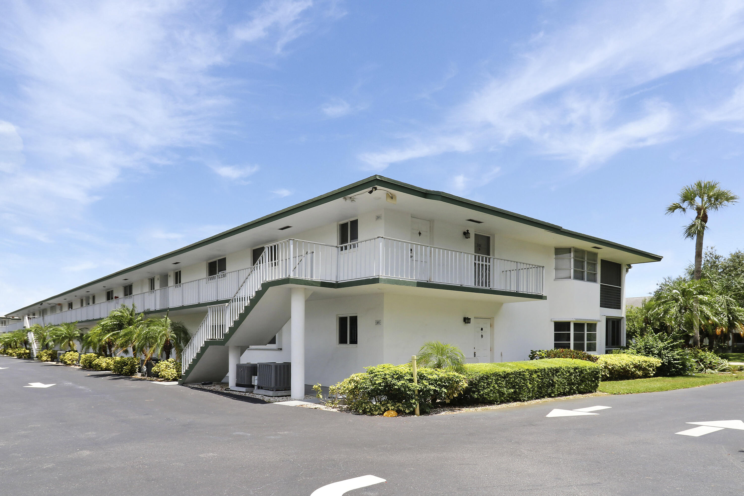 Renovated ground-floor end unit in the sought-after Tequesta Gardens community. This beautifully appointed 2-bed, 2-bath condo features an updated kitchen, newer AC, and new electrical panel. The spacious living area opens to a bright enclosed porch, while the generously sized bedrooms offer ample storage, including a walk-in closet in the primary. Enjoy community amenities including two pools, a putting green, shuffleboard, and a clubhouse with a full kitchen and BBQ area. Conveniently located within walking distance to coffee shops, restaurants, and shopping. Monthly dues include basic cable, water, sewer, exterior maintenance, and insurance.