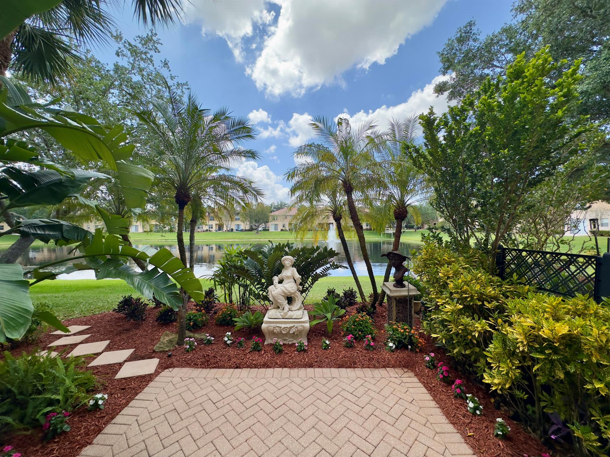 LAKEFRONT, LAKE VIEW!!! LOW HOA!!! Beautiful new landscaping and breathtaking water views surround this 2-bedroom, 2.5-bath townhome with attached garage; built in 2002 and nestled in the secure gated community of Seminole Lakes. Upgrades include: (2025)- $2,000+ Landscaping, painted driveway, garage door rollers. (2023)-$10,000+ A/C w/UV LIGHT, epoxy coated garage floor, ceiling fan in guest bedroom, dining room chandelier, verticals in living room. (2021)- $40,000 ROOF, WATER HEATER, washer, dryer, refrigerator, dishwasher, stove, microwave, high hats, smoke detectors, ceiling fans, front door handle/lock, garage door motor. Additional Upgrades: Double Pane windows, tinted sliders, oak handrail, screened front & back porches, pavers on back porch & outdoor patio & extra wide driveway!