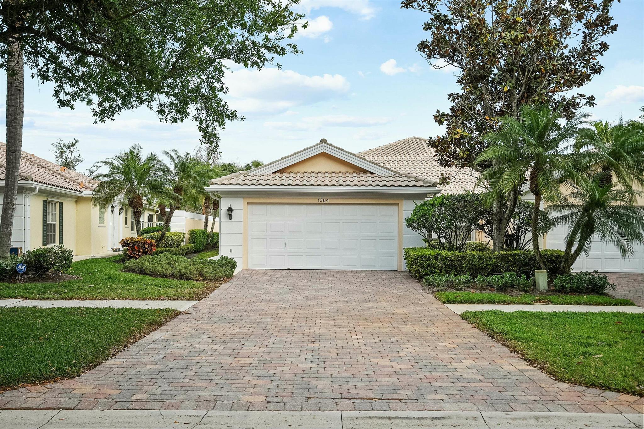Welcome to this beautifully maintained 2-bedroom, 2-bathroom villa in the sought-after Isles of Palm Beach Gardens. With a bright, open feel, this home features a spacious split floorplan that offers plenty of room for flexible living and dining arrangements. Enjoy serene lake views from the screened patio.The home is move-in ready, with a clean, well-kept interior, split bedrooms and accordion shutters for peace of mind. The location can't be beat - just minutes from beaches, shopping, restaurants, golf, major highways, and Palm Beach International Airport.The Isles community offers great amenities, including a fitness center, heated pool, and courts for pickleball, tennis, and bocce ball. This villa combines comfort, convenience, and a prime location!
