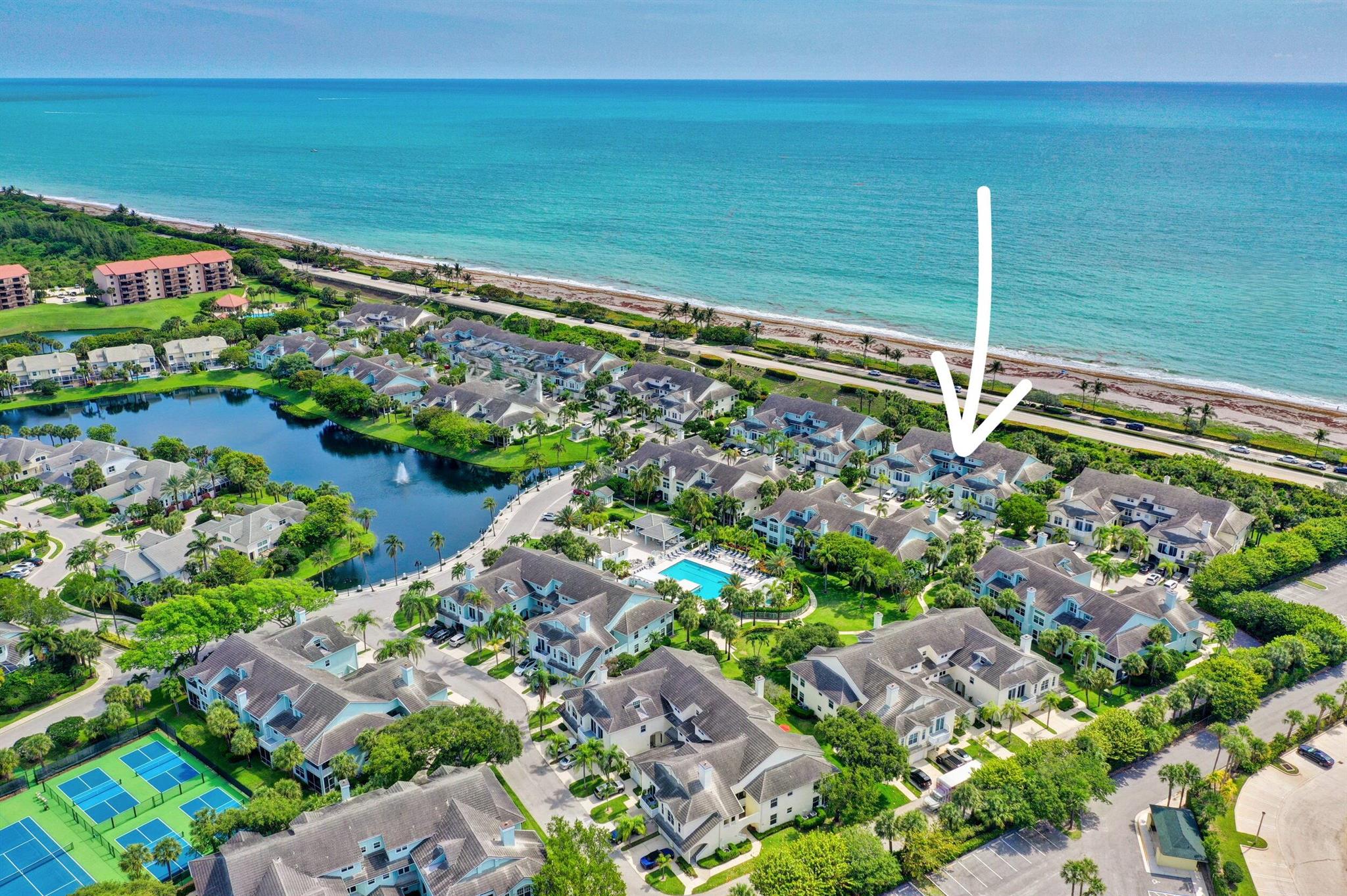Discover paradise in this rarely available 3-bedroom, 3-bathroom beachside condo, renovated in Winter 2024 and just steps from Jupiter's pristine beach. Located in the dog-friendly community of Sea Colony, this single-story condo offers 1,822 square feet of living space--NO STAIRS! It features a 1-car garage and two screened lanais, perfect for relaxing to the sound of the waves while overlooking lush tropical landscaping. Bright and airy, the condo boasts high-end finishes, including a marble backsplash, quartz countertops, and tile throughout. Upon entering, you're welcomed into a spacious kitchen with counter seating, seamlessly flowing into the open dining and living area, which extends to a screened-in lanai.

 The split-bedroom floor plan ensures privacy:

The primary suite features a private screened lanai, walk-in closet, an en-suite bath, and a conveniently located washer and dryer.

The second bedroom is a private en-suite with its own bathroom and access to another screened-in lanai.

The third bedroom offers flexibility as a guest room, home office, or den, with easy access to the third full bathroom.

 Sea Colony is a 24-hour gated community offering private beach access to Jupiter's dog-friendly beaches, a resort-style pool, hot tub, pickleball and tennis courts, and an on-site gym. Lounge by the pool, surrounded by tropical breezes, water features, and stunning landscaping. Plus, new 2024 roof and a fully paid front entrance renovation is set for completion in 2025. All paid in full no assessments due.

 Just minutes away, enjoy waterfront dining, sunset cruises, deep-sea fishing, world-class golf, shopping, and endless outdoor activities.

 Welcome to the best of Jupiter living!