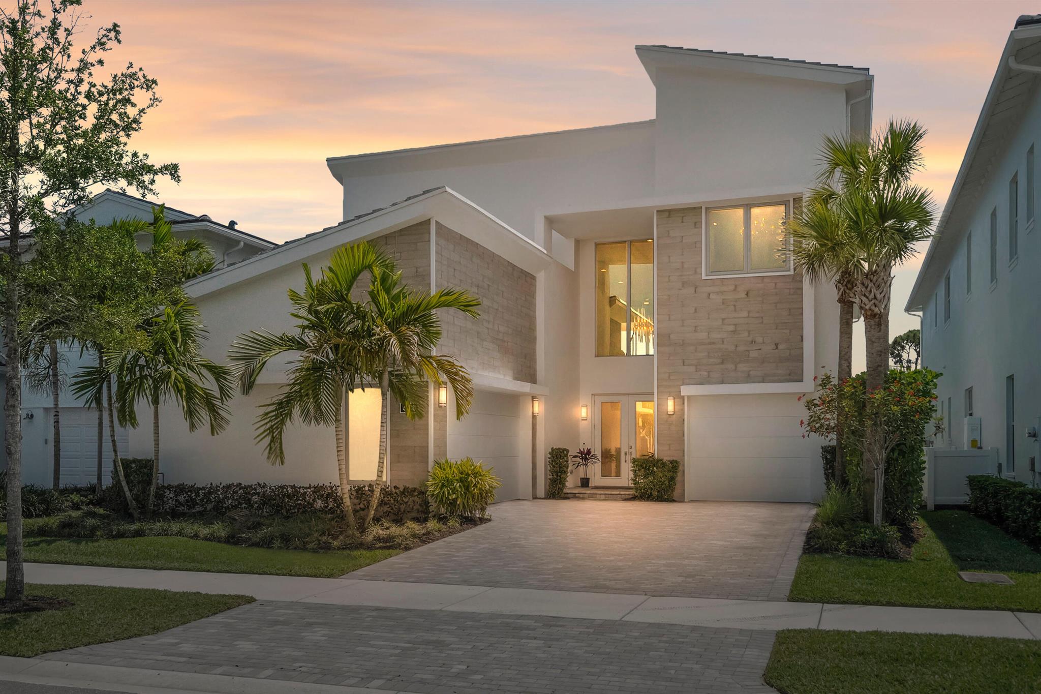 Presenting 4210 Mendel Lane -- a breathtaking, move-in-ready designer model home boasting 5 bedrooms, 5.5 bathrooms, and 5,200 square feet of modern sophistication. Every detail has been meticulously curated, from the gleaming white marble floors and dramatic coffered ceilings to the exquisite light fixtures, custom millwork, and a chef's kitchen outfitted with premium, top-tier appliances.Offered fully furnished, this residence is a showcase of refined elegance and thoughtful design. Each spacious bedroom includes a private en suite bath adorned with bespoke tile work, while the expansive first-floor primary suite is a true sanctuary, featuring a spa-inspired bathroom with a freestanding soaking tub, frame-less glass shower, and a custom-built walk-in closet. Additional highlights include two sunlit, fully equipped laundry rooms, a generous upstairs family/game room with private balcony, and a three-car garage&#x14;offering ideal accommodations for both family living and visiting guests.

Step outside into your own private resort-style oasis, complete with a sparkling pool, serene waterfall features, a relaxing spa, and a covered lanai with a fully equipped summer kitchen&#x14;perfect for effortless entertaining and enjoying the very best of Florida luxury living.

Alton offers an exceptional lifestyle, where premier amenities cater to both relaxation and recreation. Residents enjoy exclusive access to a beautifully appointed clubhouse, resort-style swimming pool, state-of-the-art fitness center, and impeccably maintained sports courts for pickleball, tennis, and basketball.
